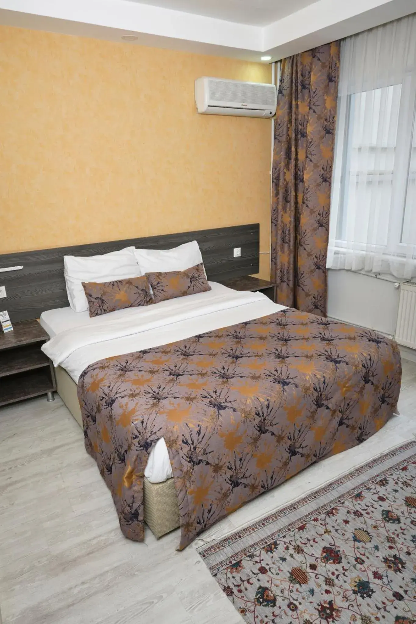 air conditioner, Bed in The Breeze Hotel air conditioner, Bed in The Breeze Hotel