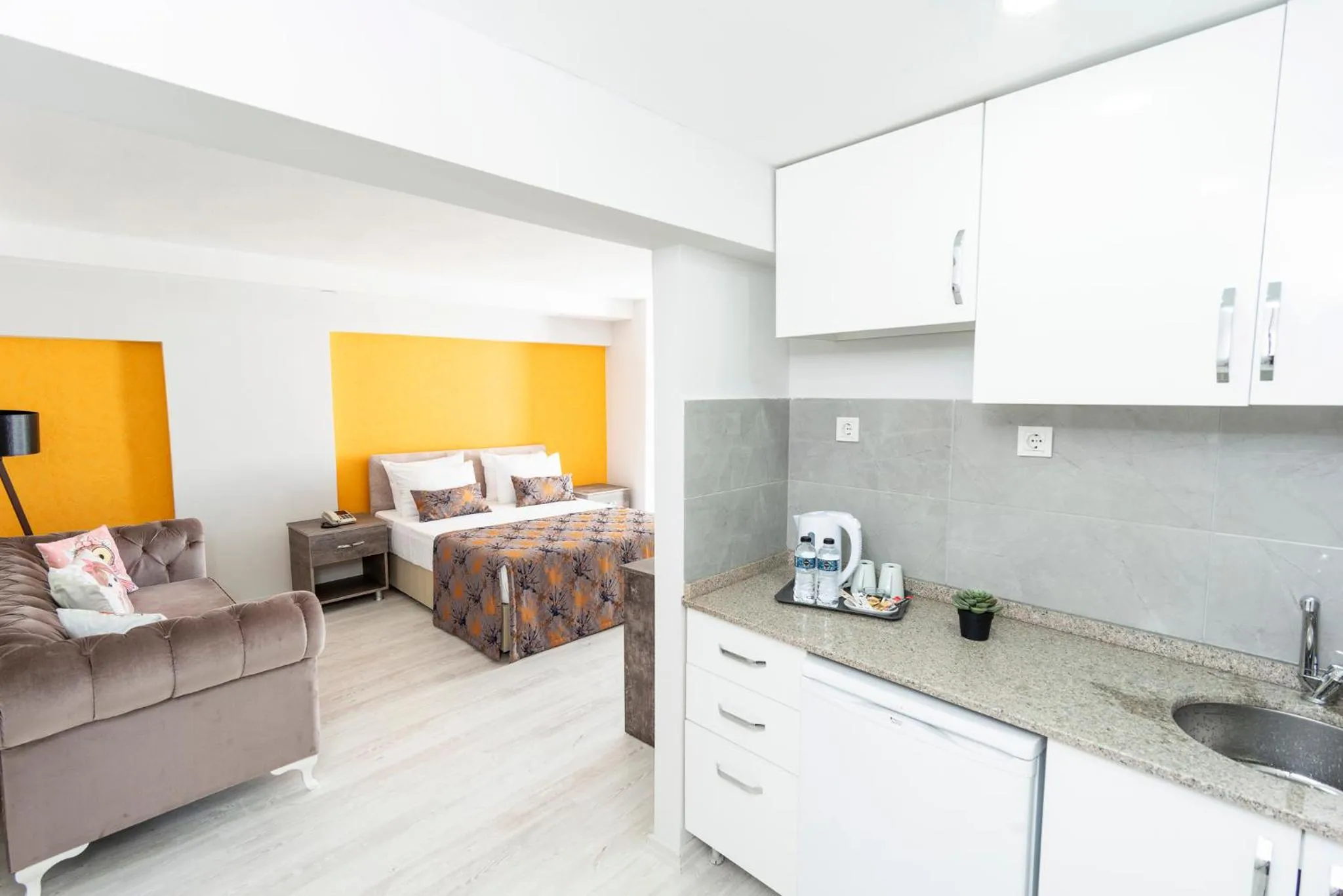 Seating area, Bed in The Breeze Hotel