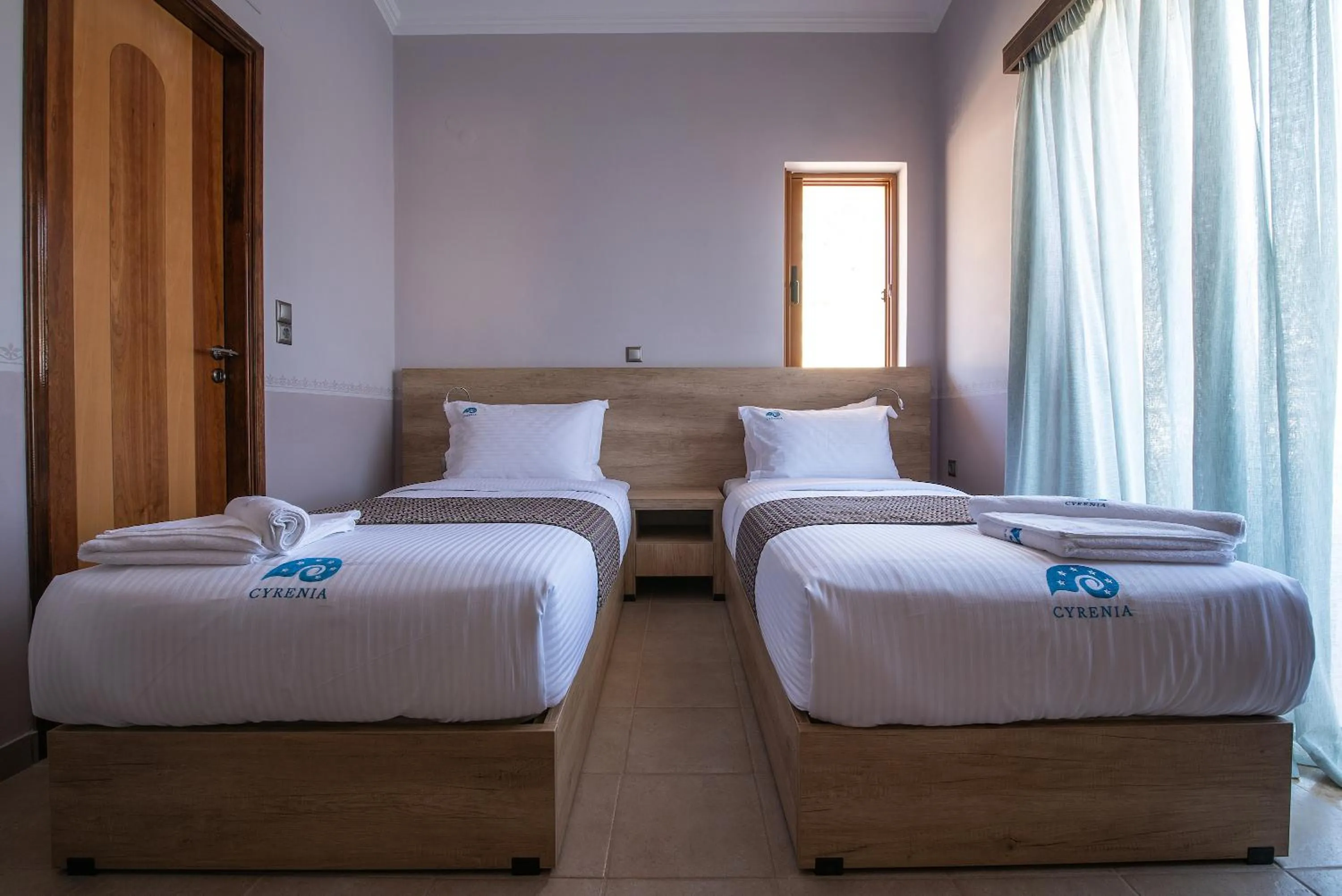 Bed in Cyrenia Guesthouse