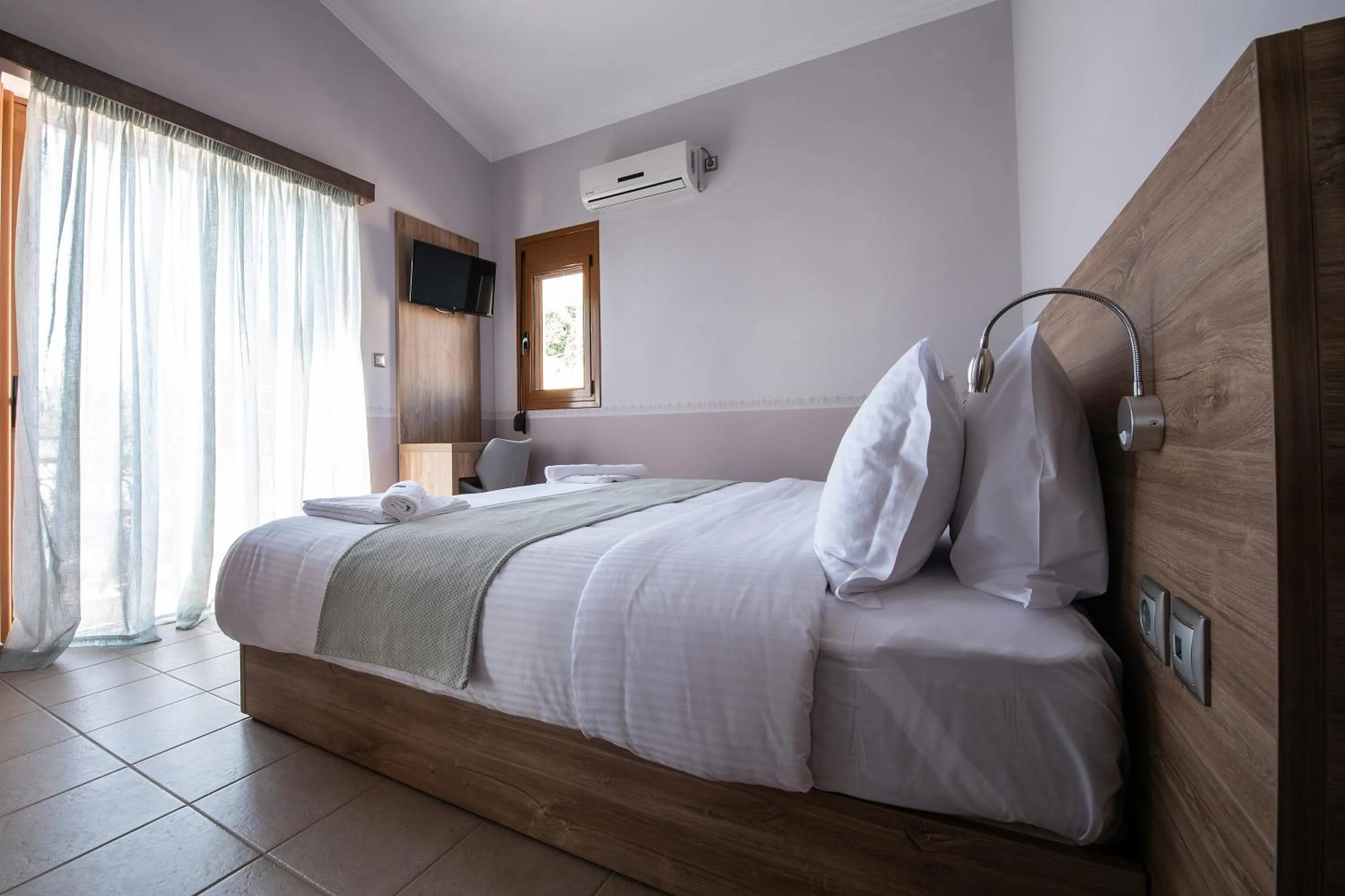 Bed in Cyrenia Guesthouse