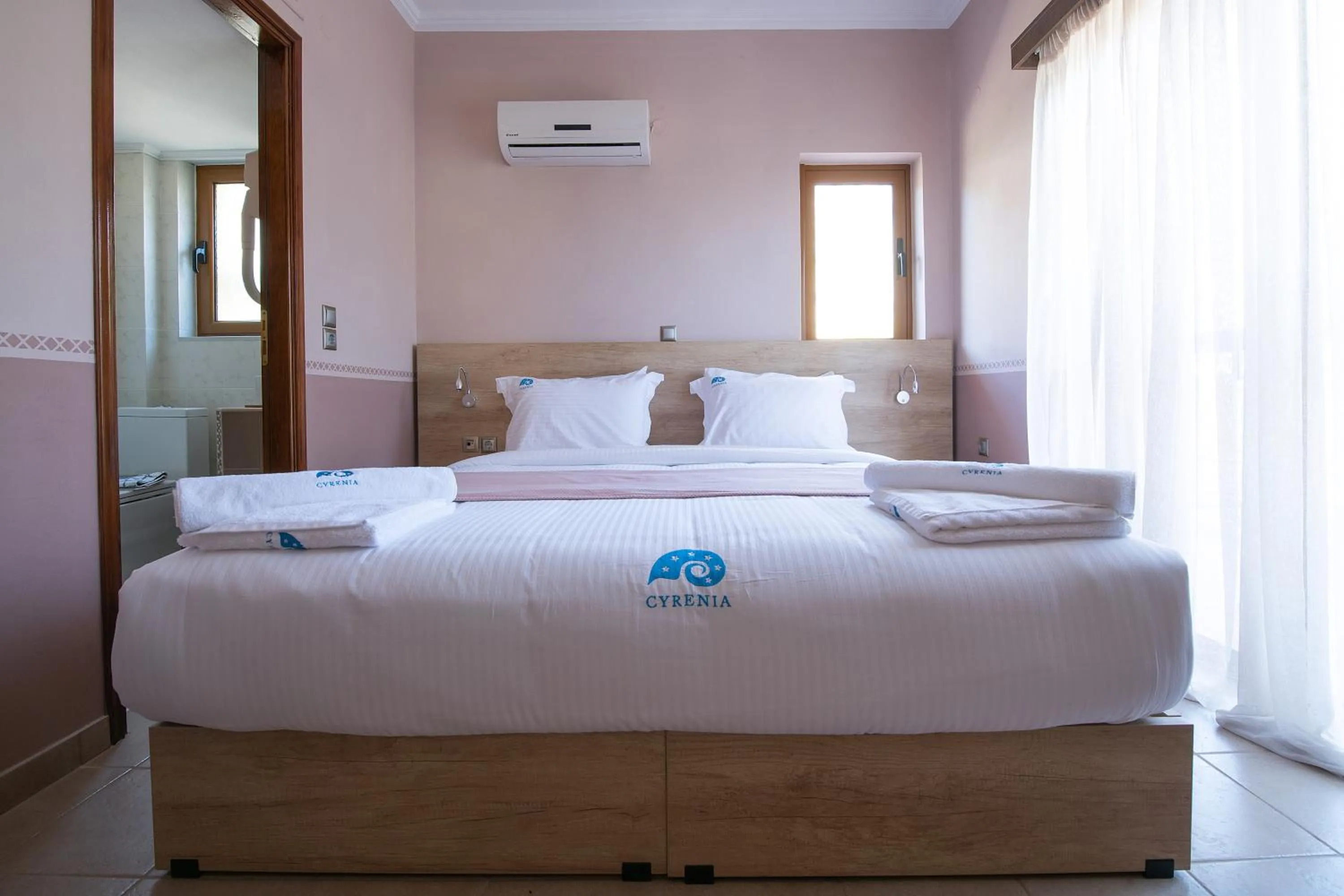 Bed in Cyrenia Guesthouse