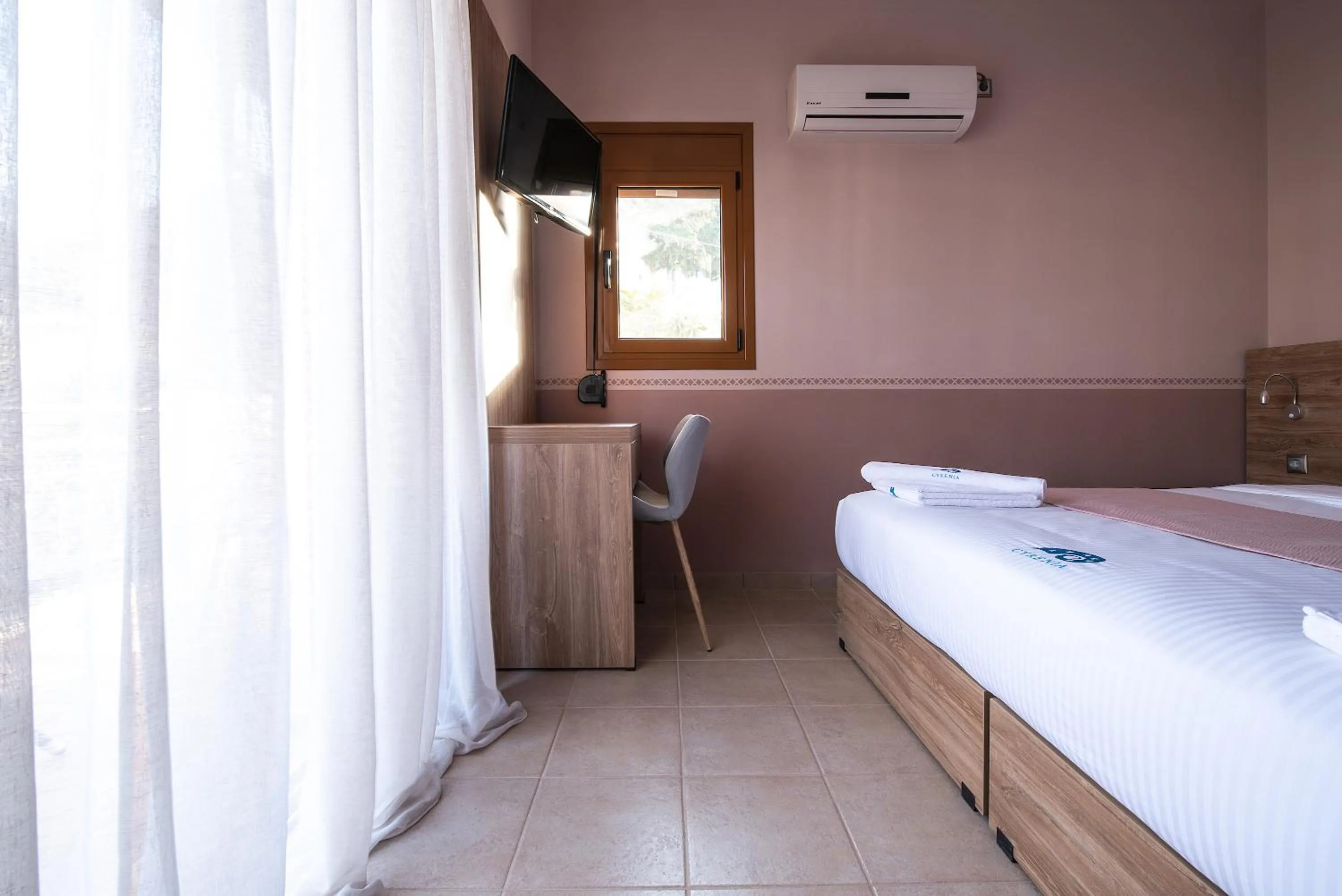 Bed in Cyrenia Guesthouse