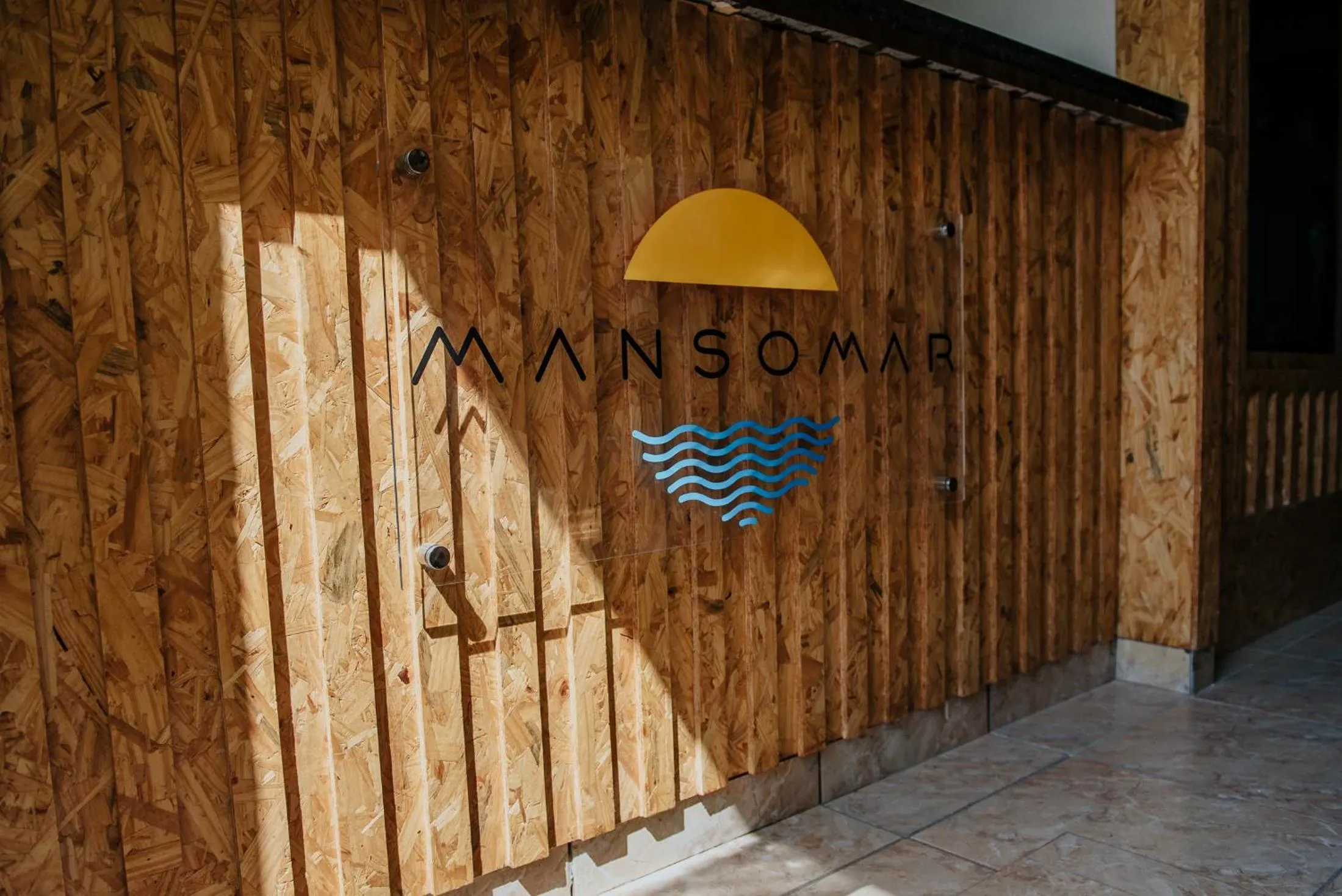 Property logo or sign in Mansomar