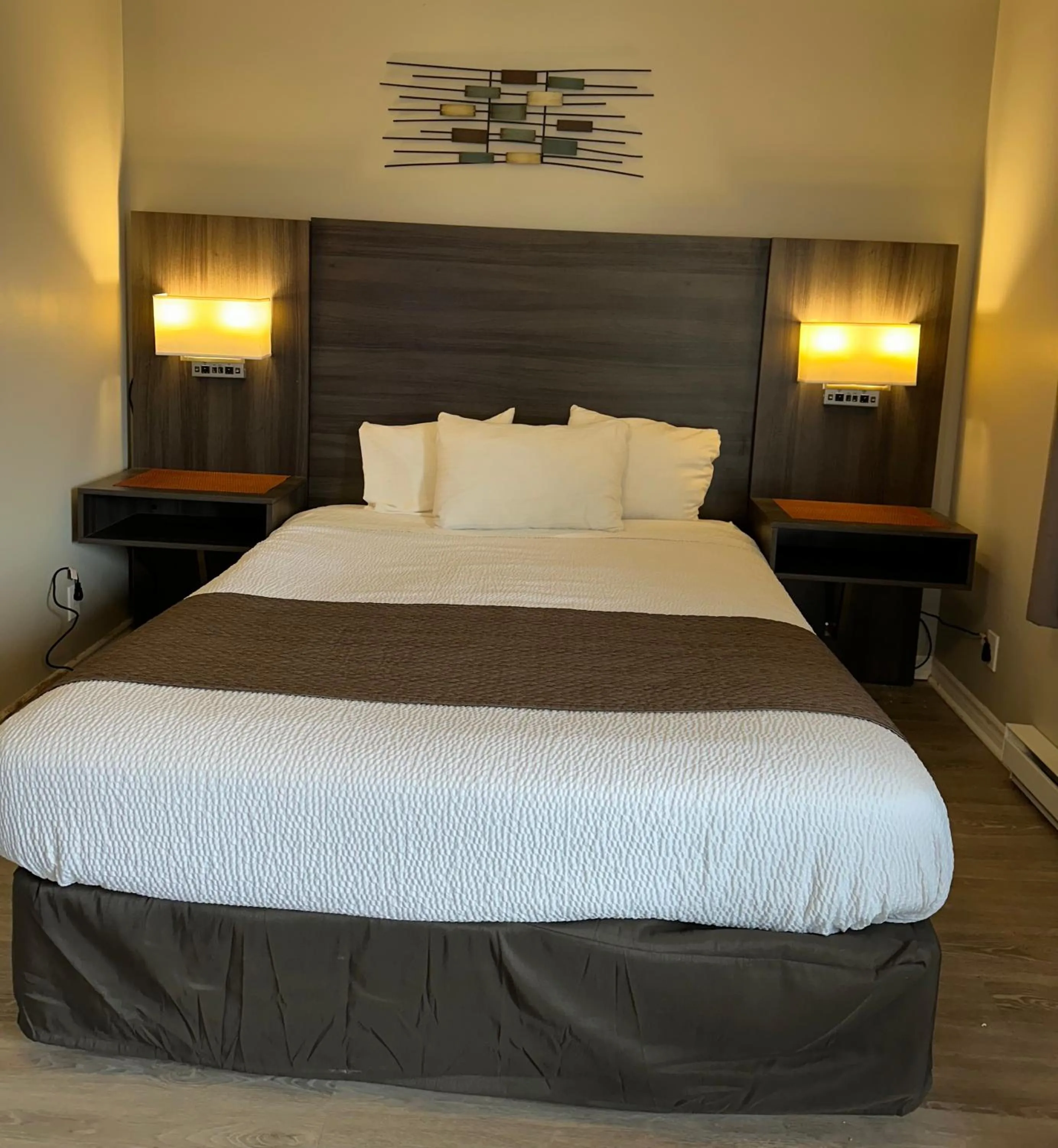 Bed in Lakeview Motel & Cottage