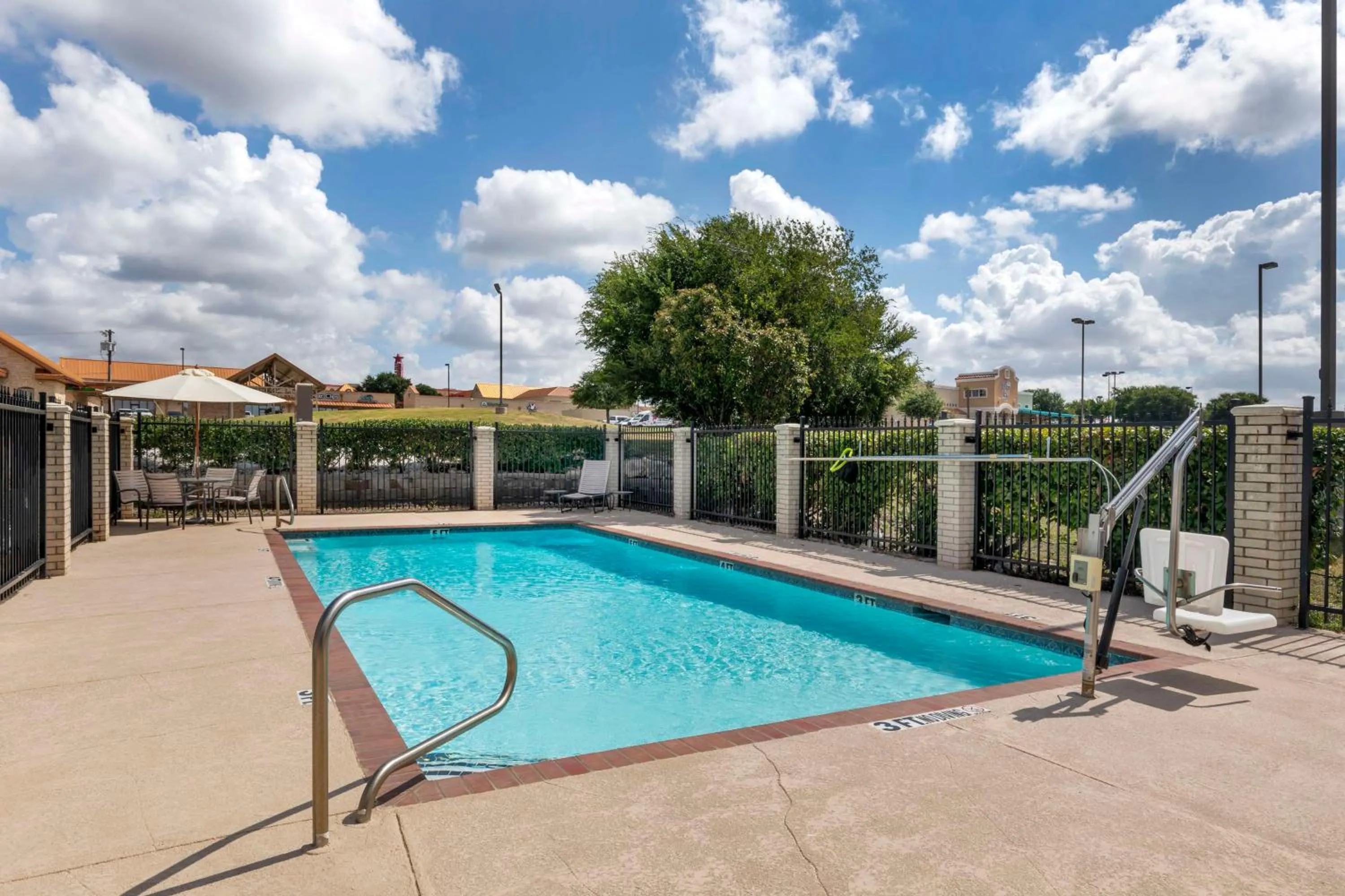 Pool view in Best Western Plus Lake Worth Inn & Suites