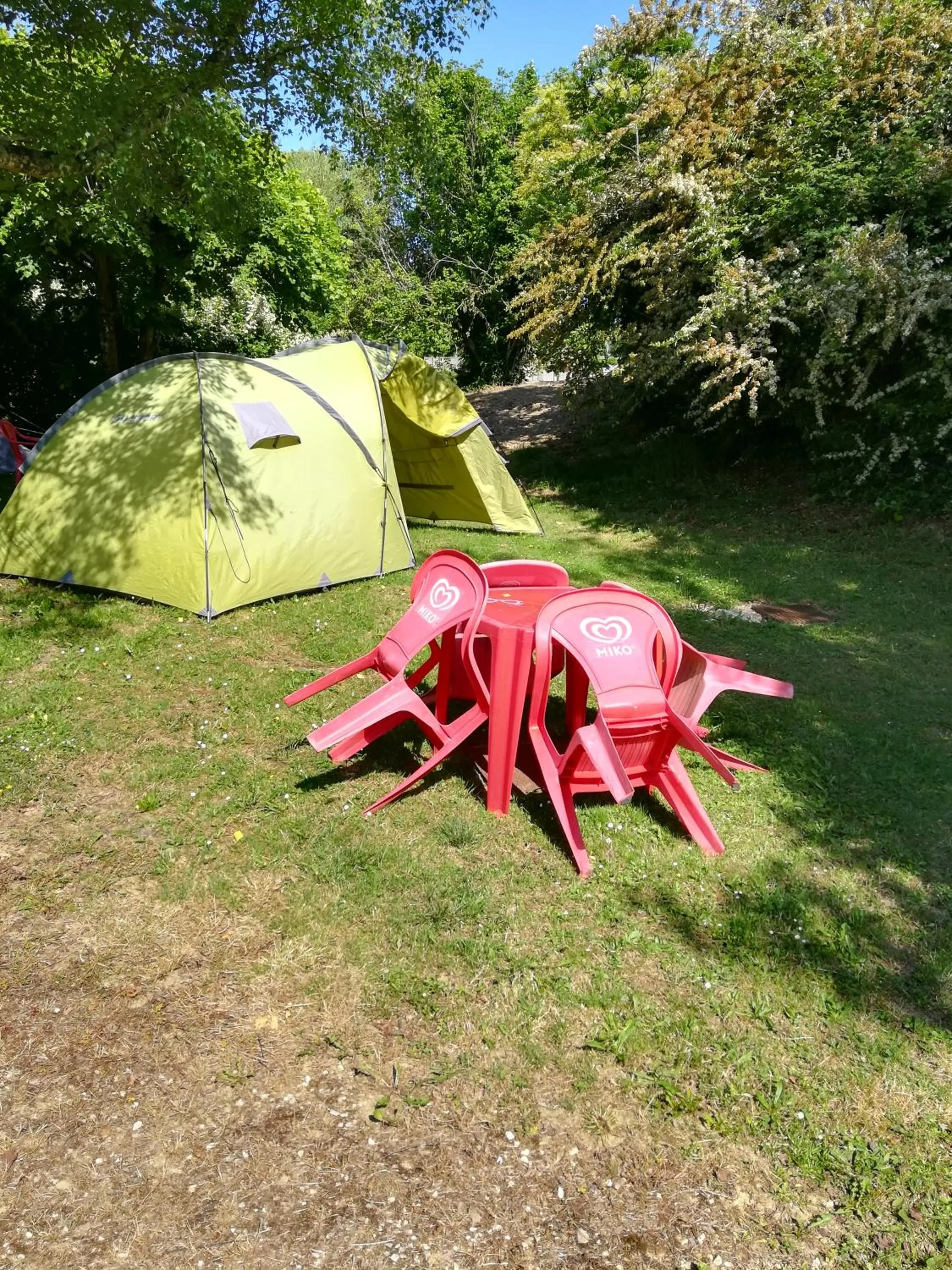 Text overlay in PARADISE CHALLETS AND CAMPING