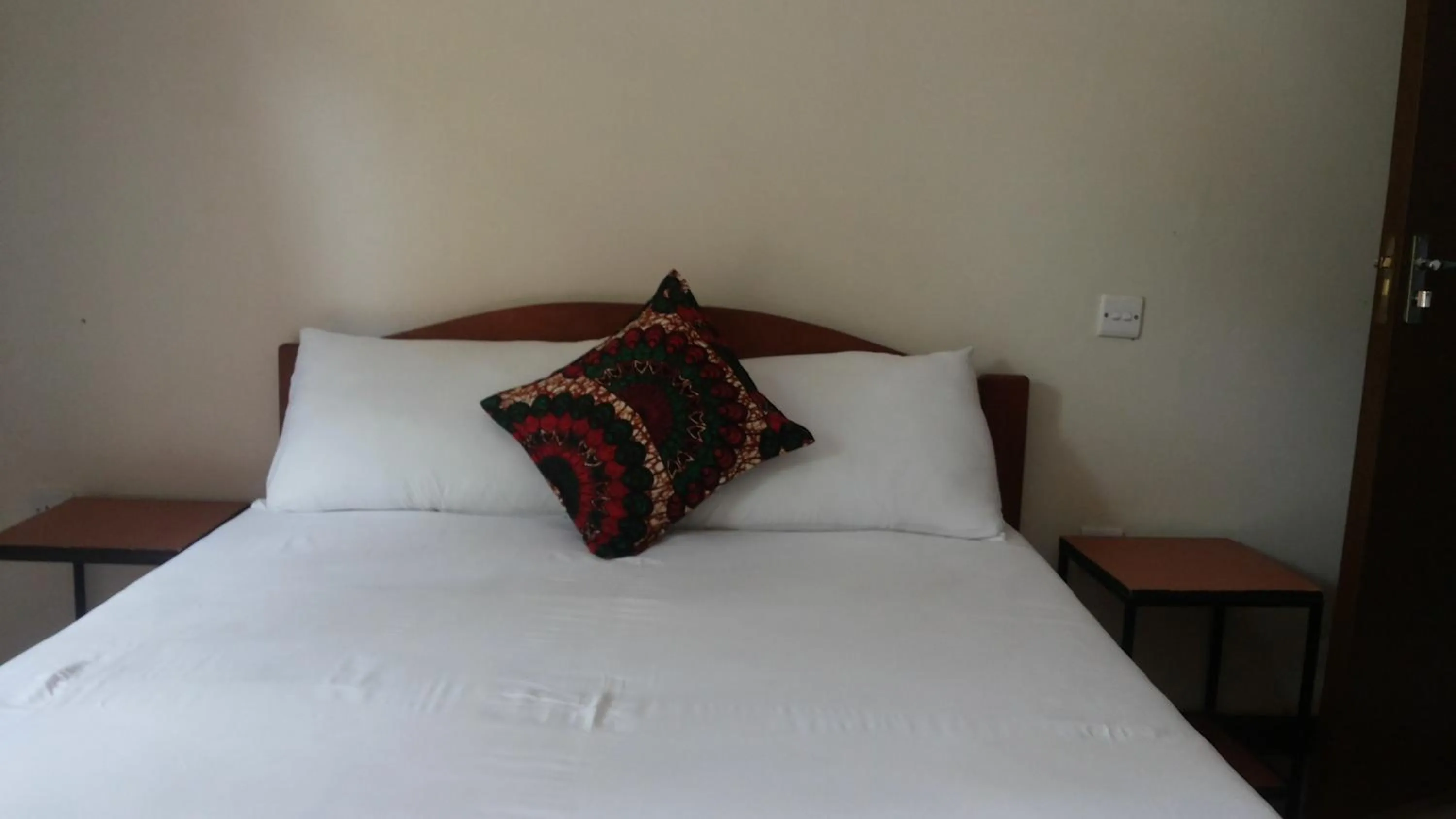 Bed in White Castle Hotel Arua
