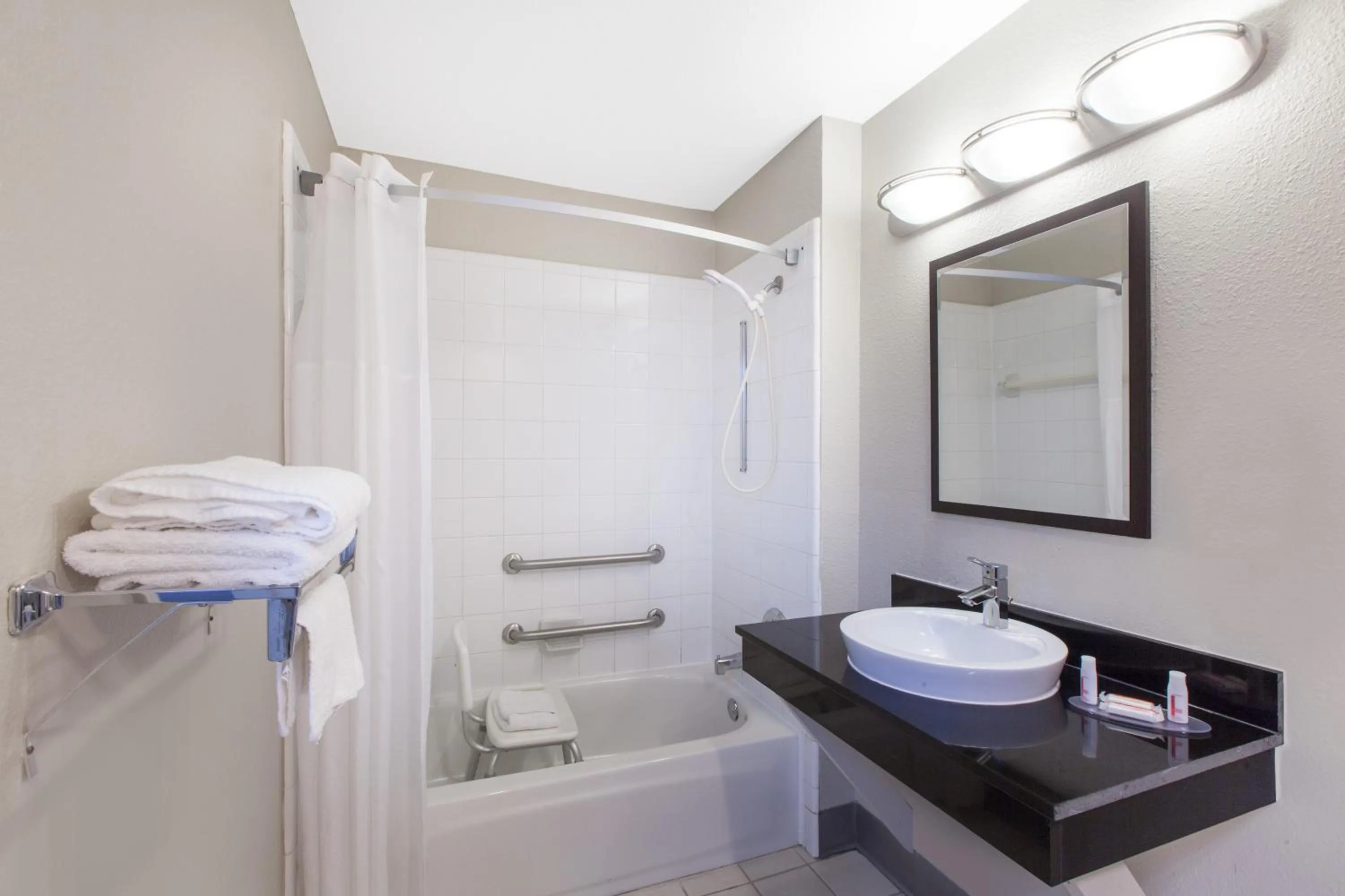 Bathroom in Days Inn by Wyndham Ennis