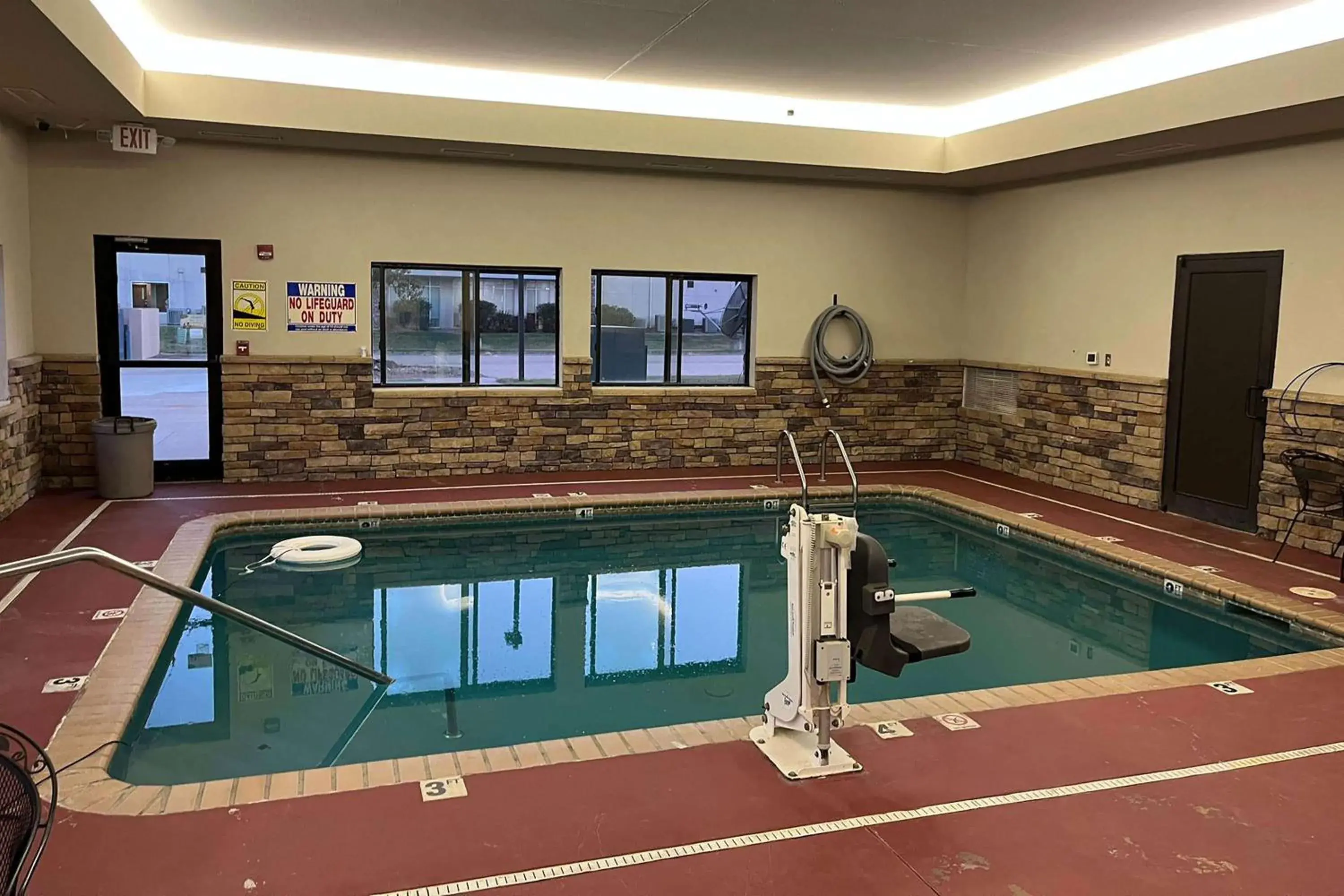 Swimming pool in SureStay Plus Hotel by Best Western Coffeyville Swimming pool in SureStay Plus Hotel by Best Western Coffeyville