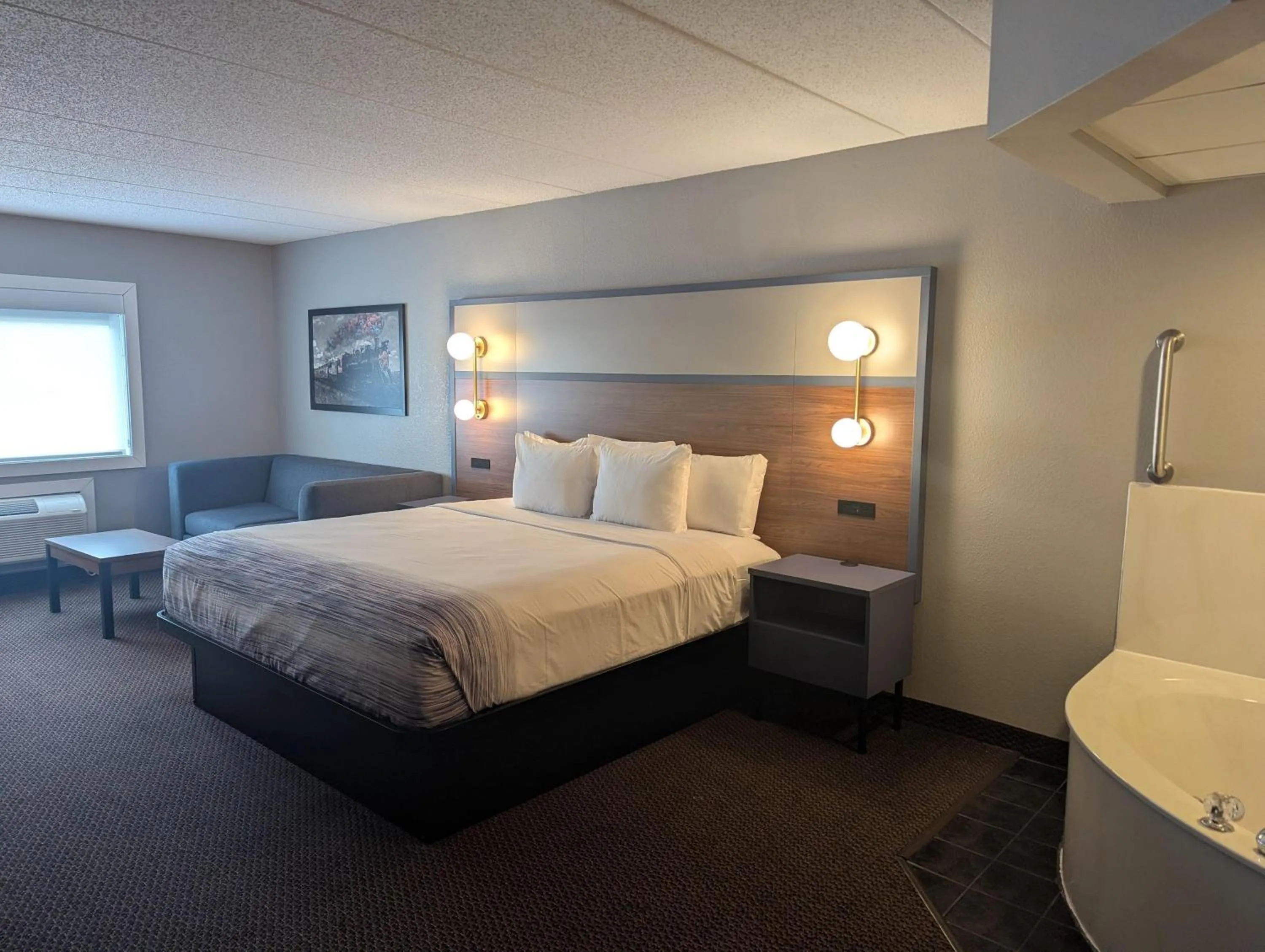 Photo of the whole room, Bed in AmericInn by Wyndham St. Peter