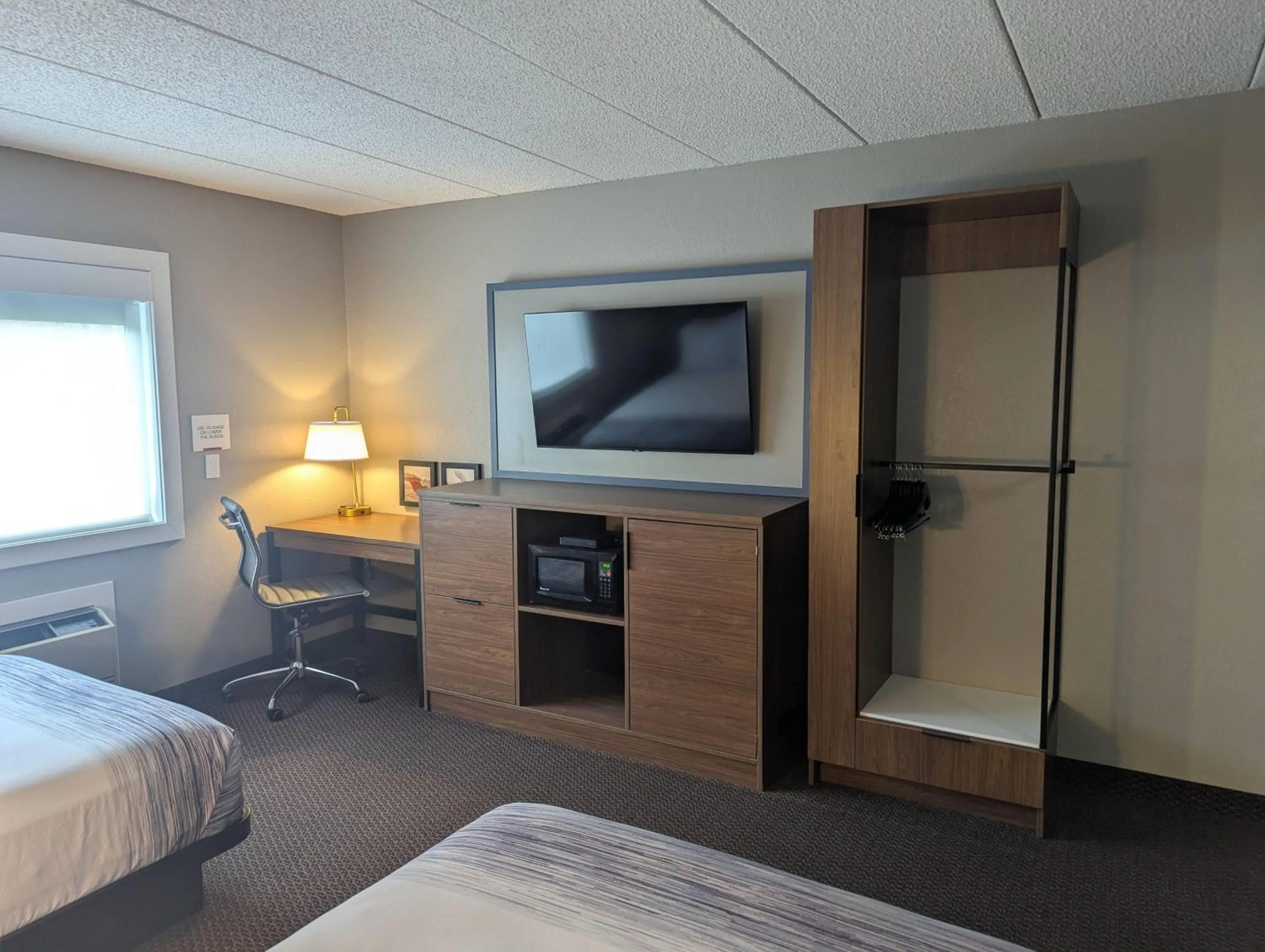 Photo of the whole room, Bed in AmericInn by Wyndham St. Peter