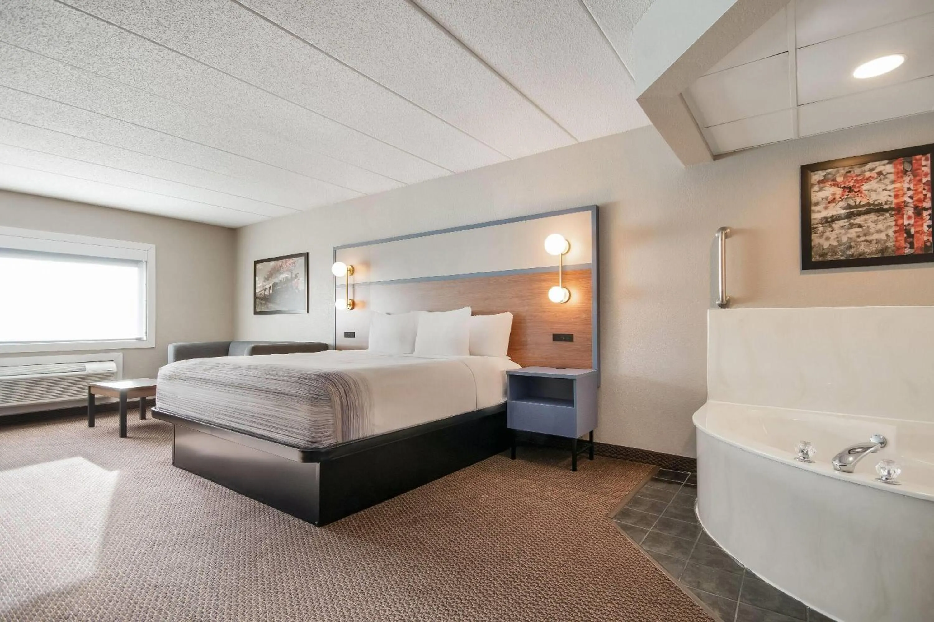 Photo of the whole room, Bed in AmericInn by Wyndham St. Peter