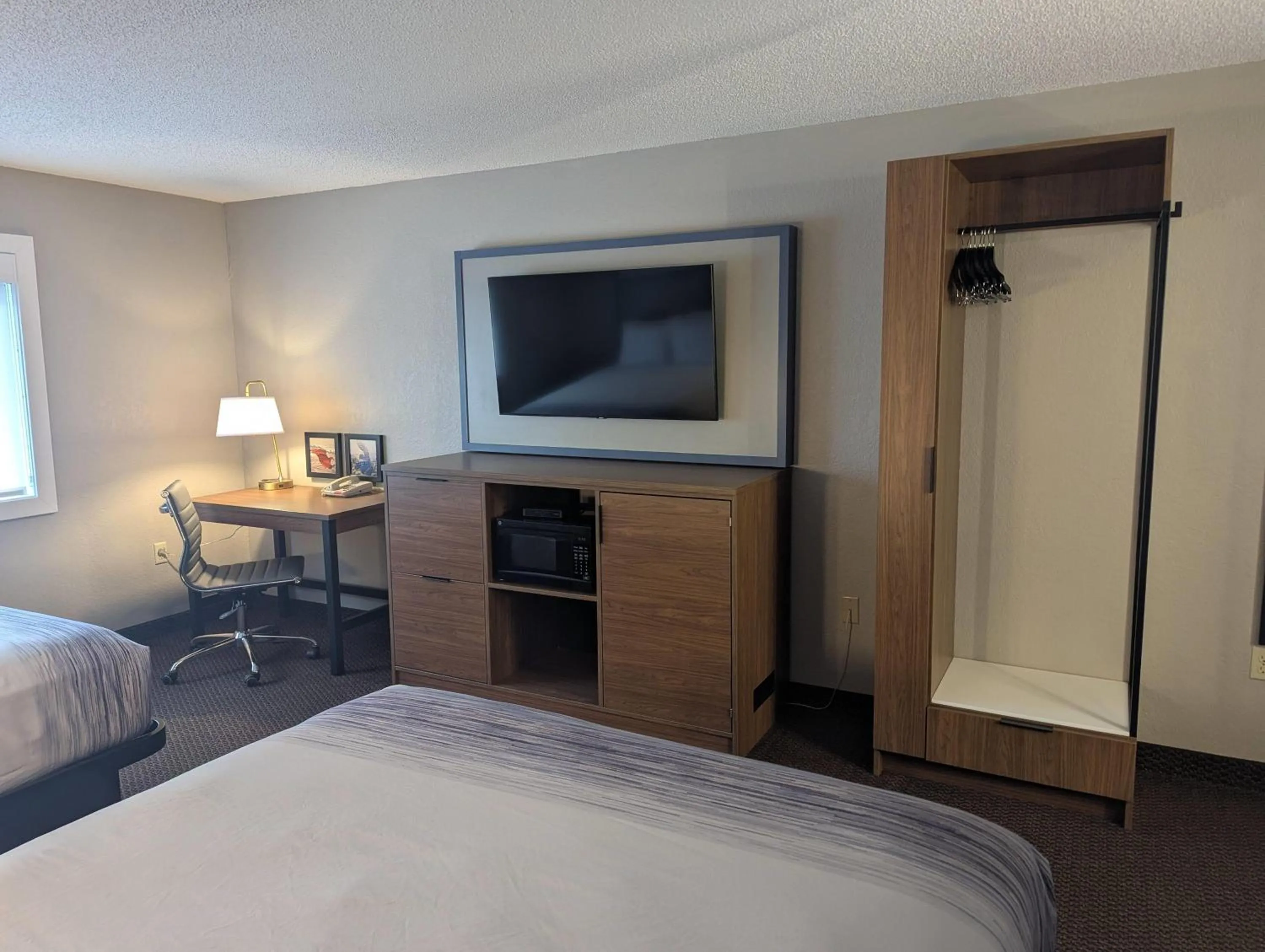 Photo of the whole room, Bed in AmericInn by Wyndham St. Peter