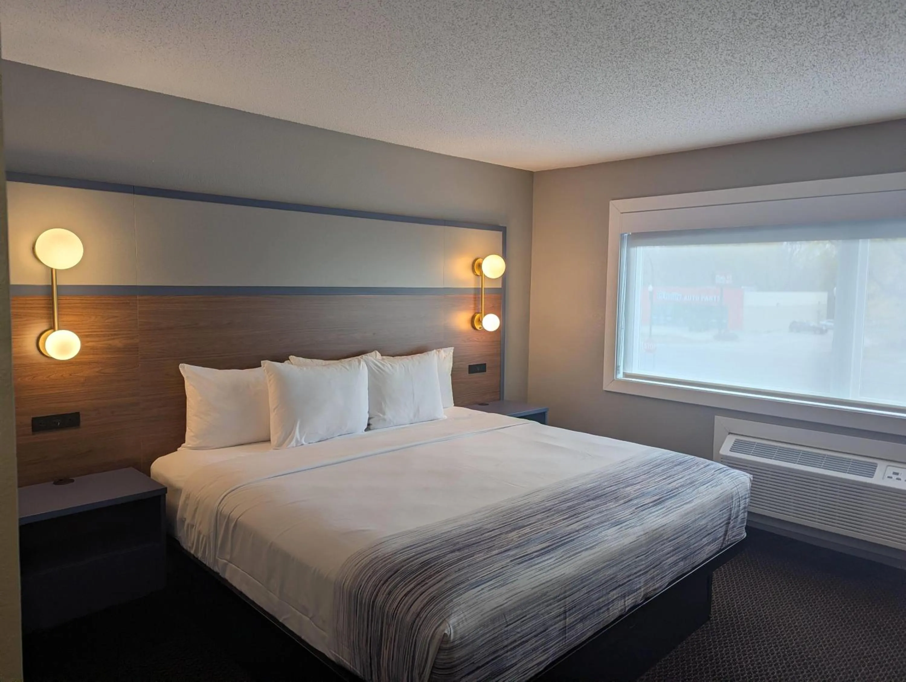 Photo of the whole room, Bed in AmericInn by Wyndham St. Peter