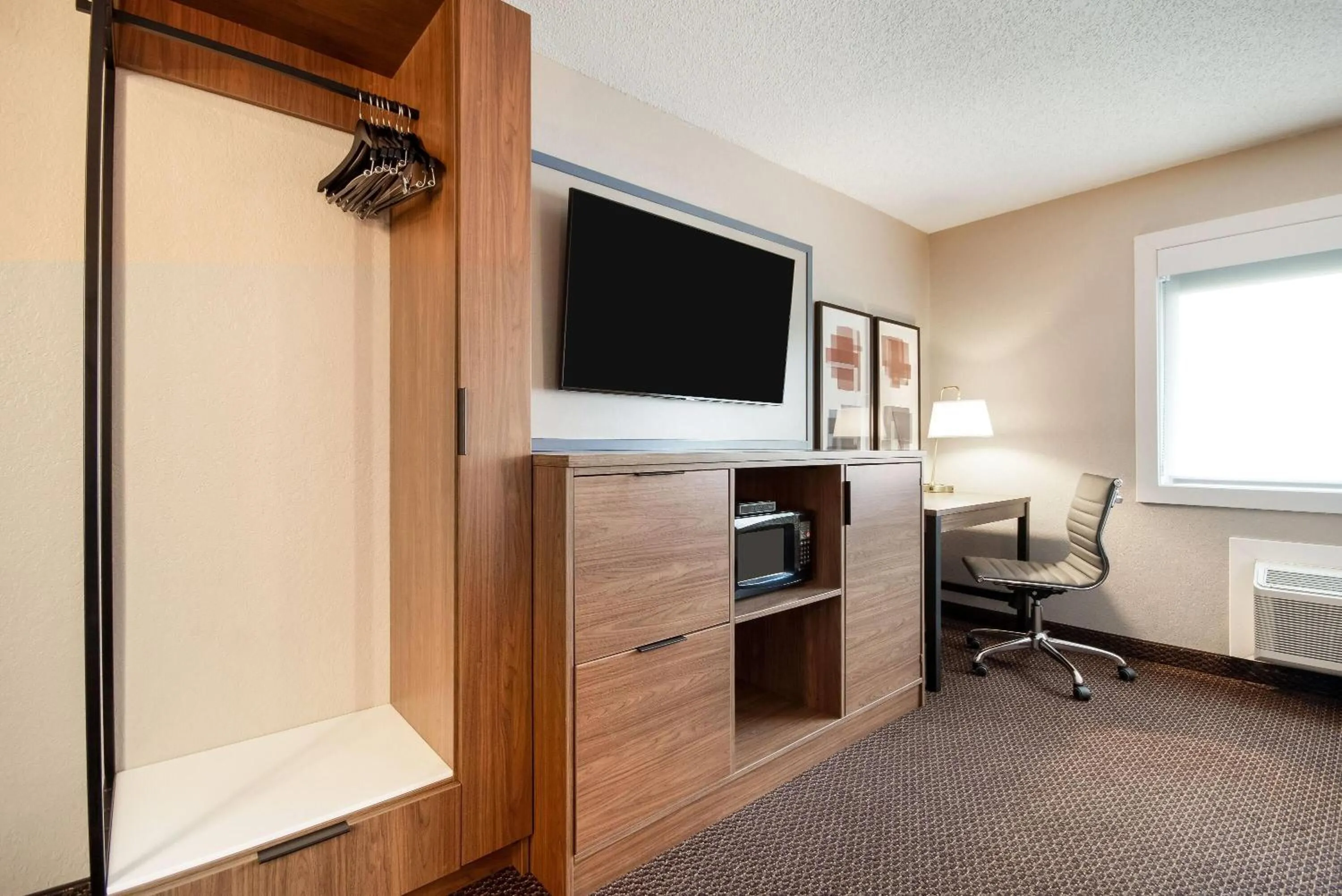 Bed in AmericInn by Wyndham St. Peter