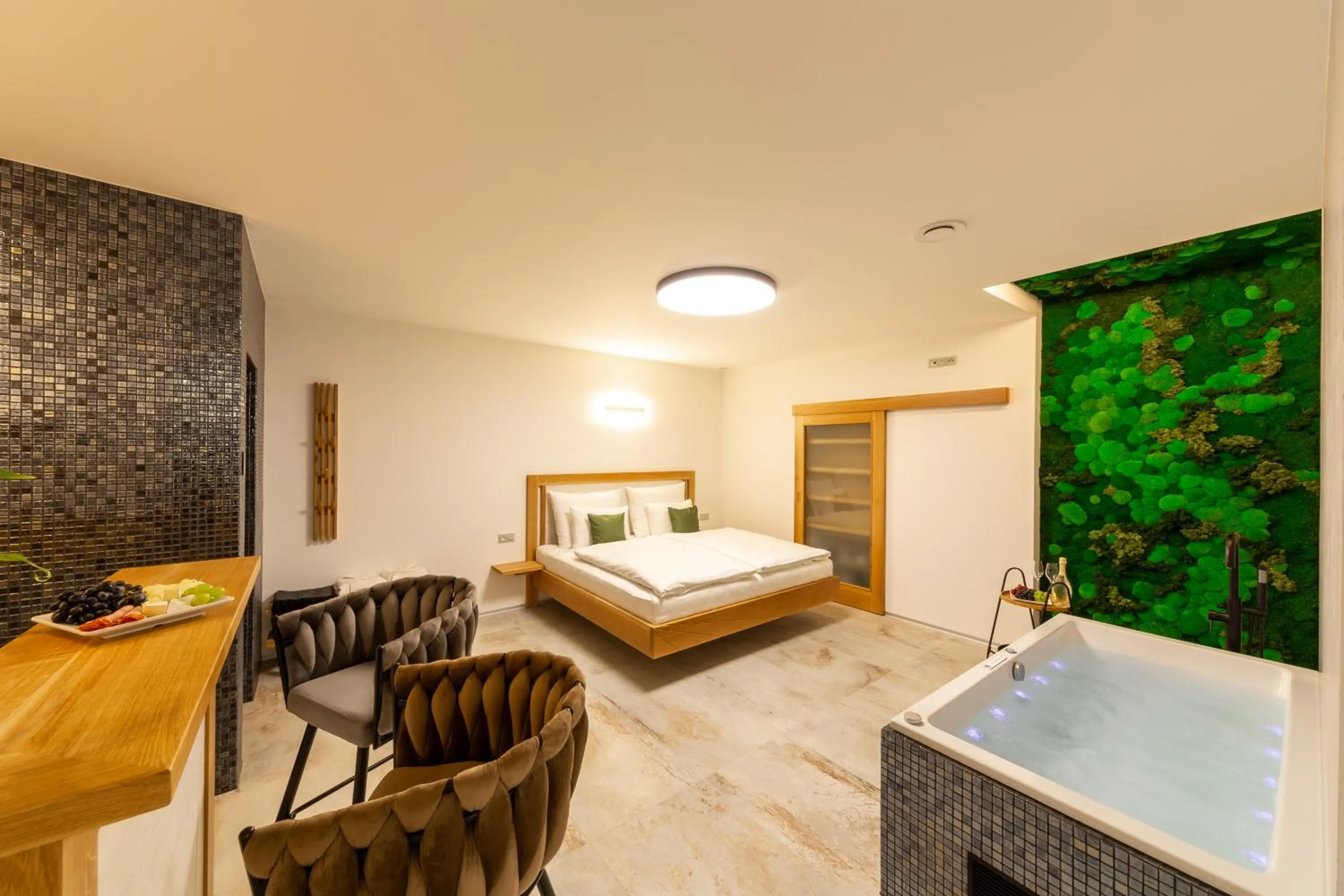 Bed in Bohemia Inn Hotel