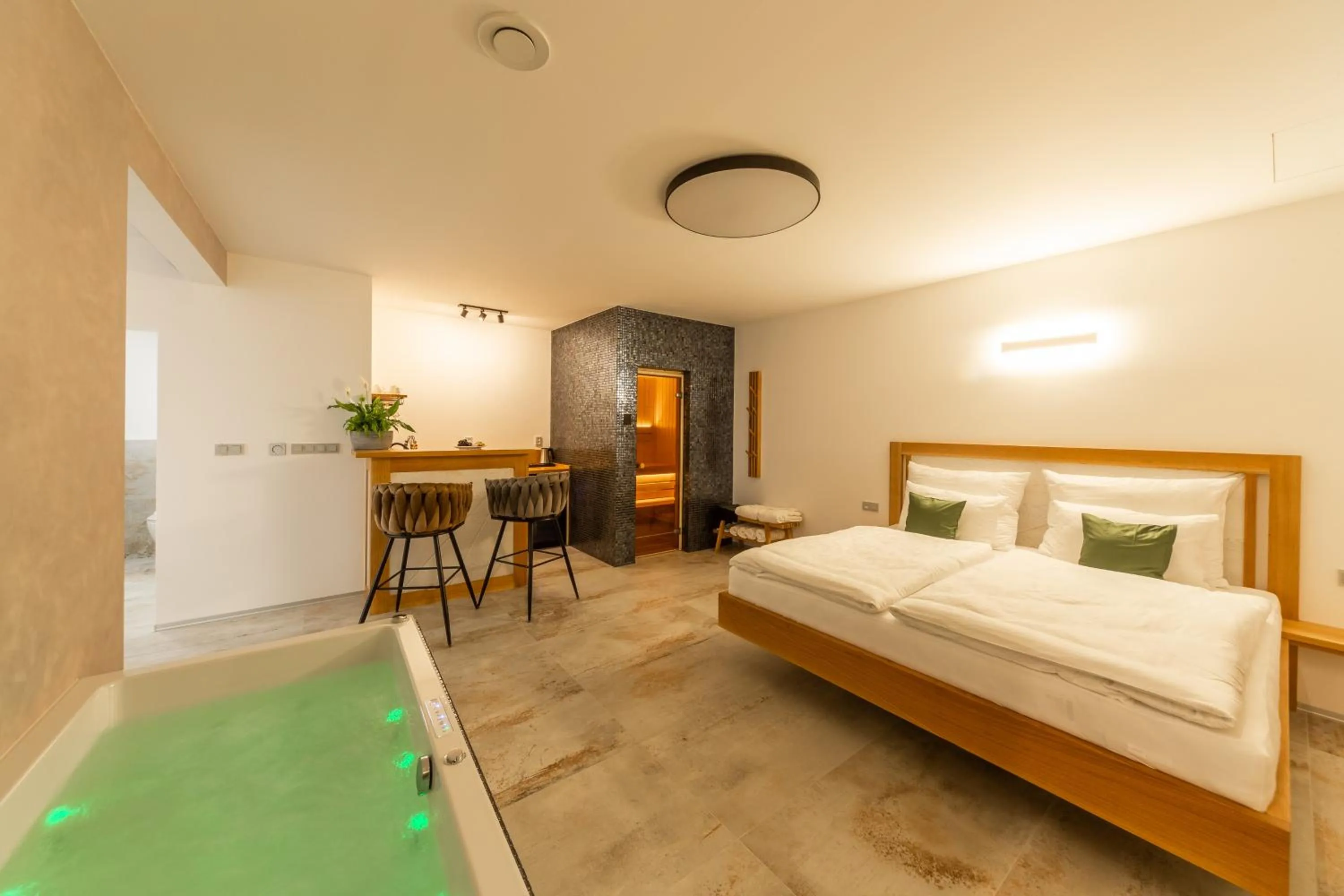 Bed in Bohemia Inn Hotel