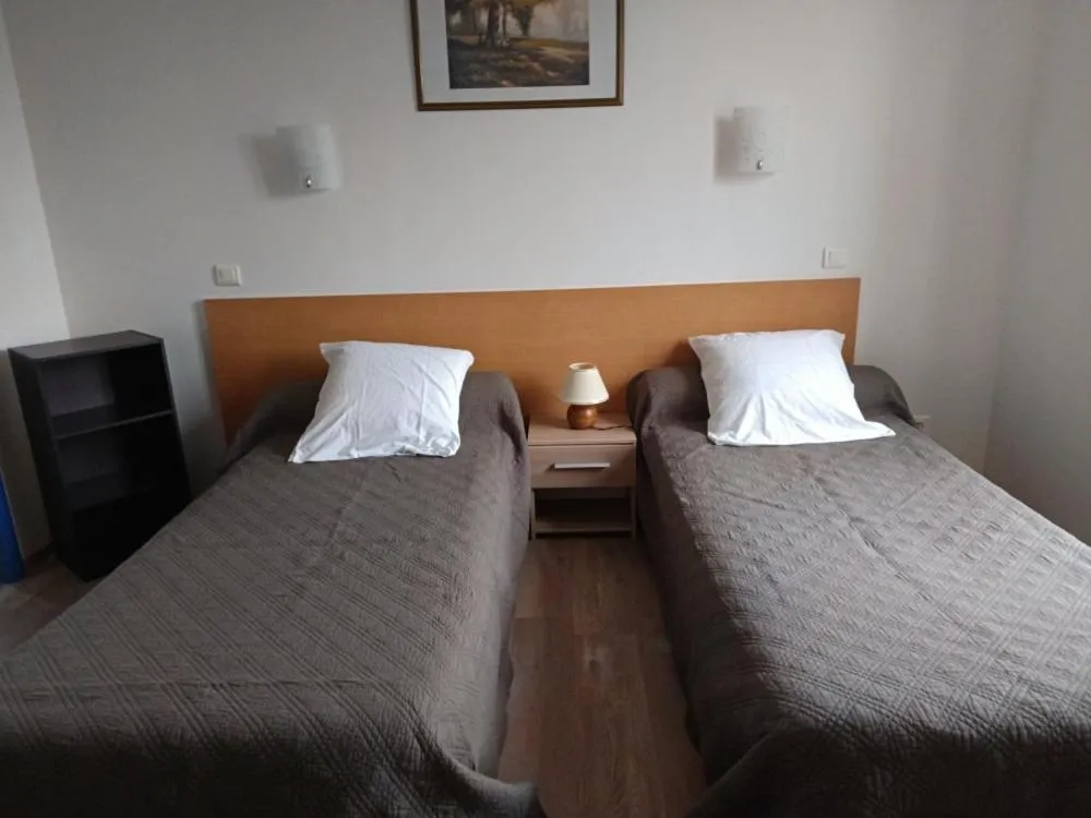 Bed in Auberge le Cévenol