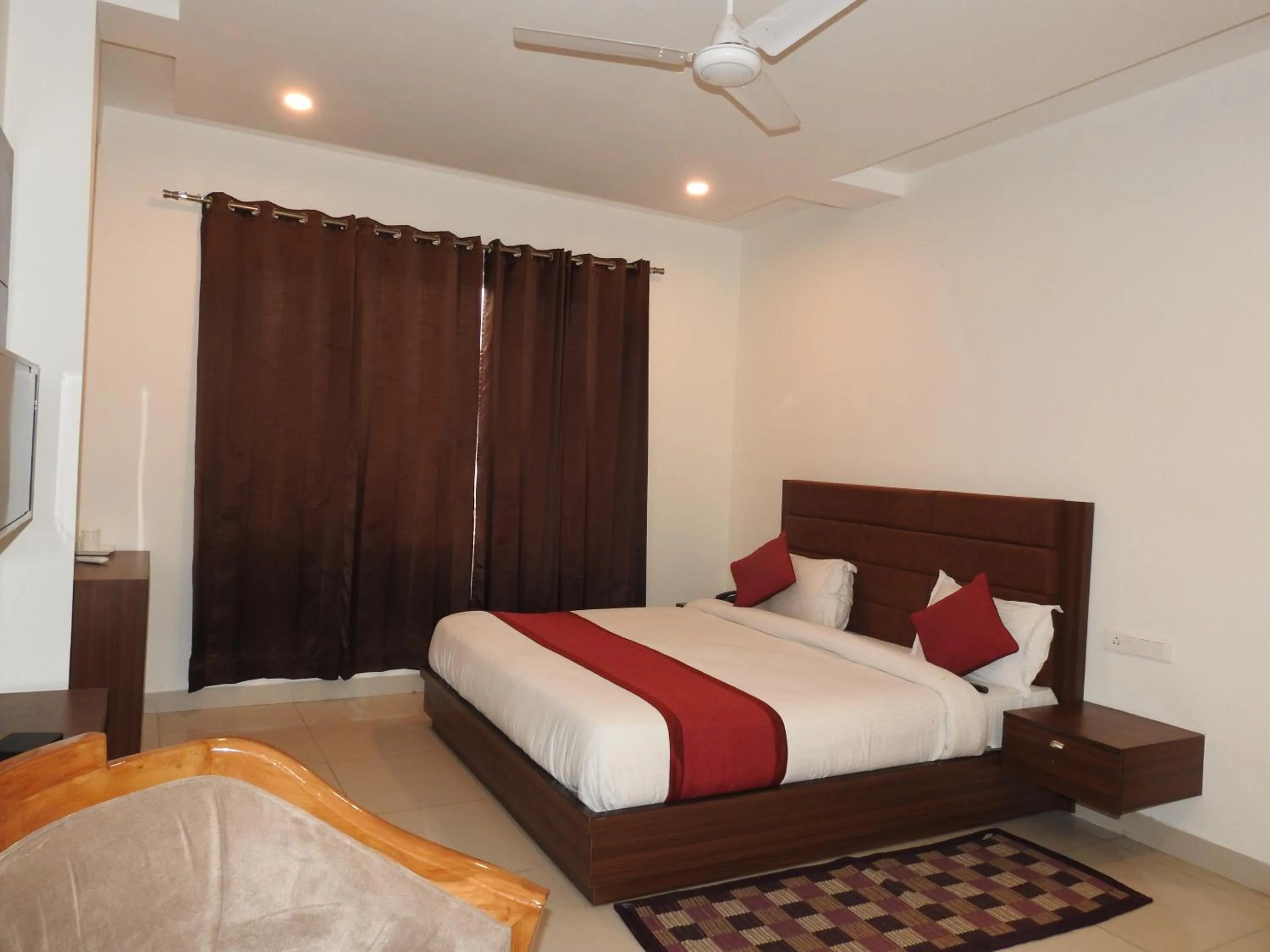 Bedroom in Hotel Aakash Residency