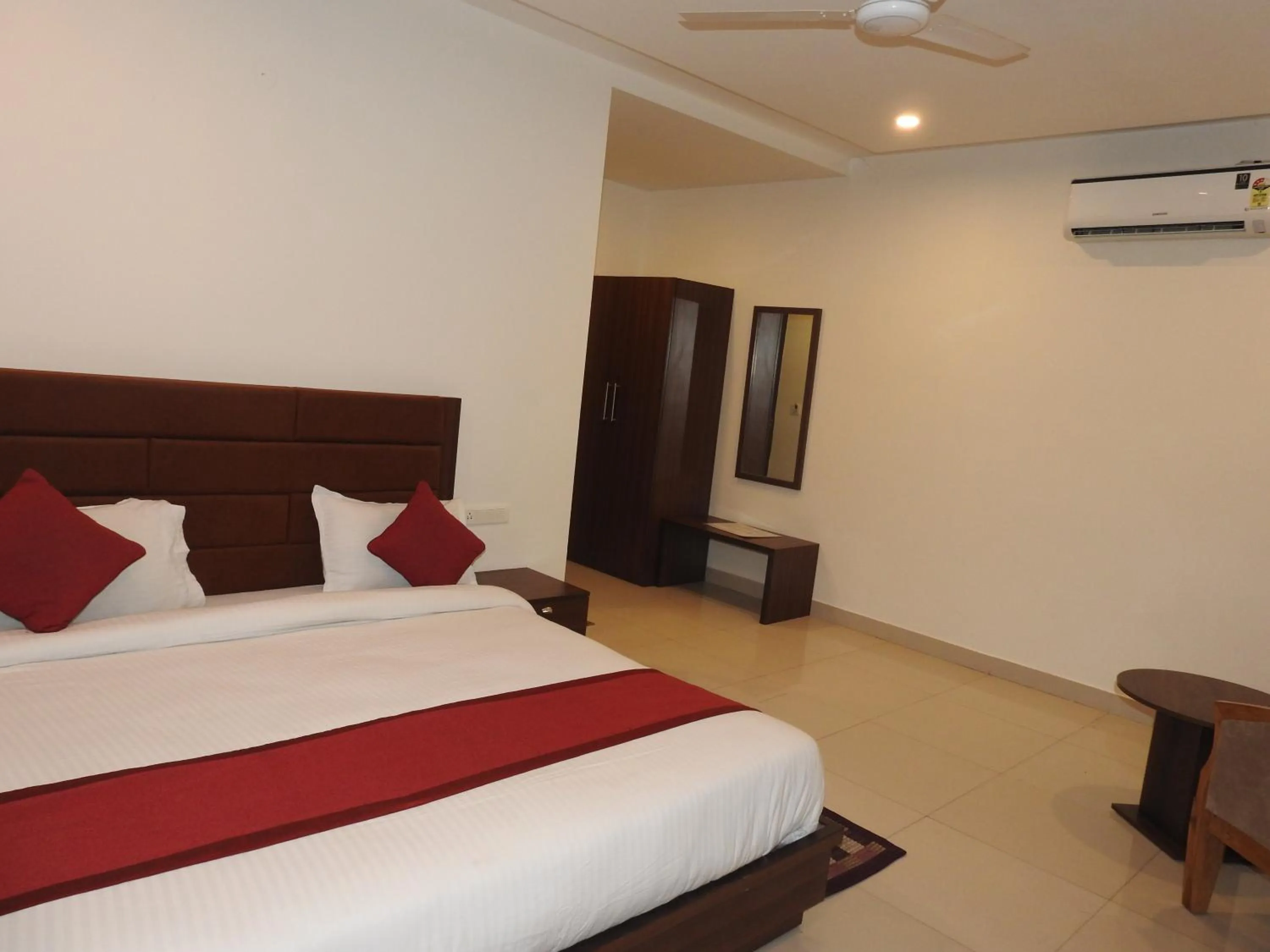 Bedroom in Hotel Aakash Residency
