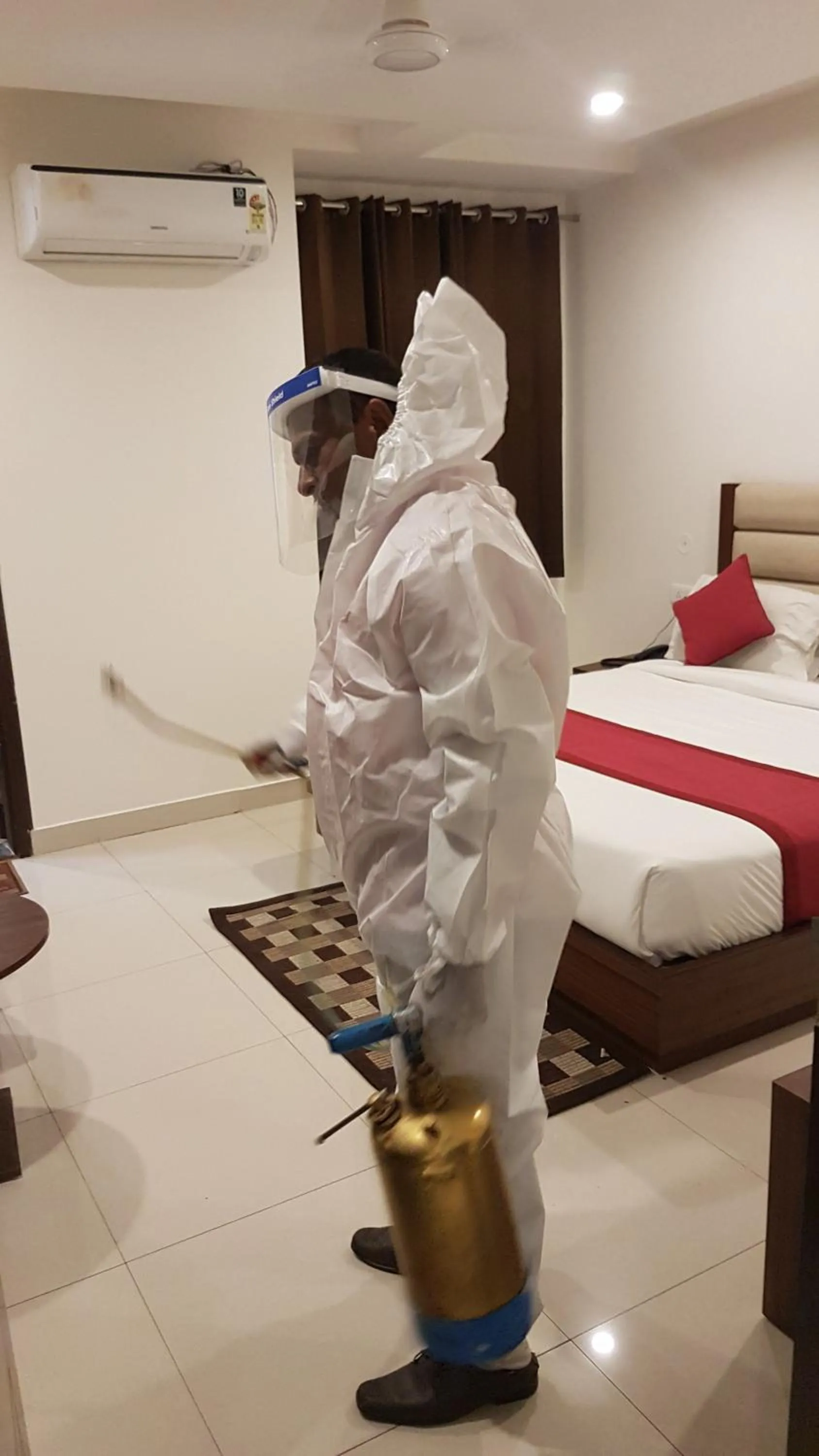 Bedroom in Hotel Aakash Residency