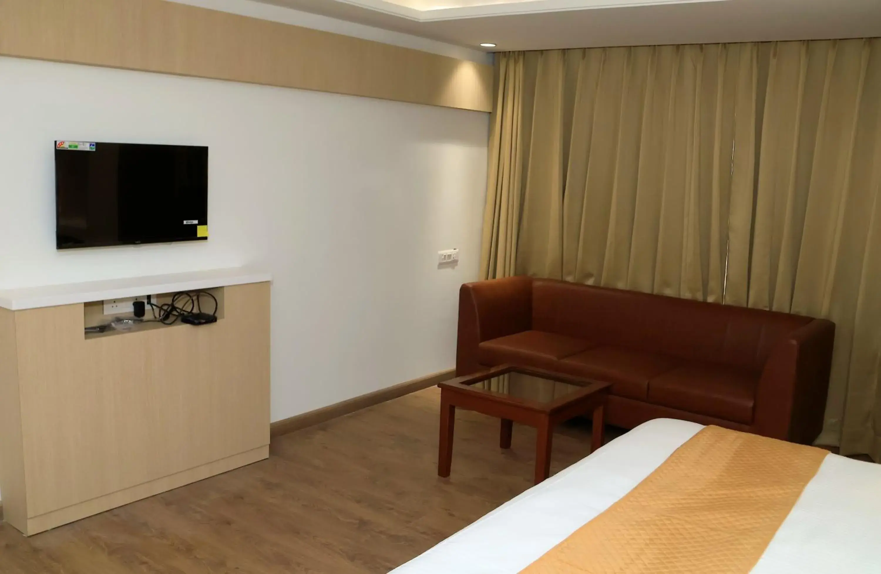 Seating area, Bed in Hotel Radiance Seating area, Bed in Hotel Radiance