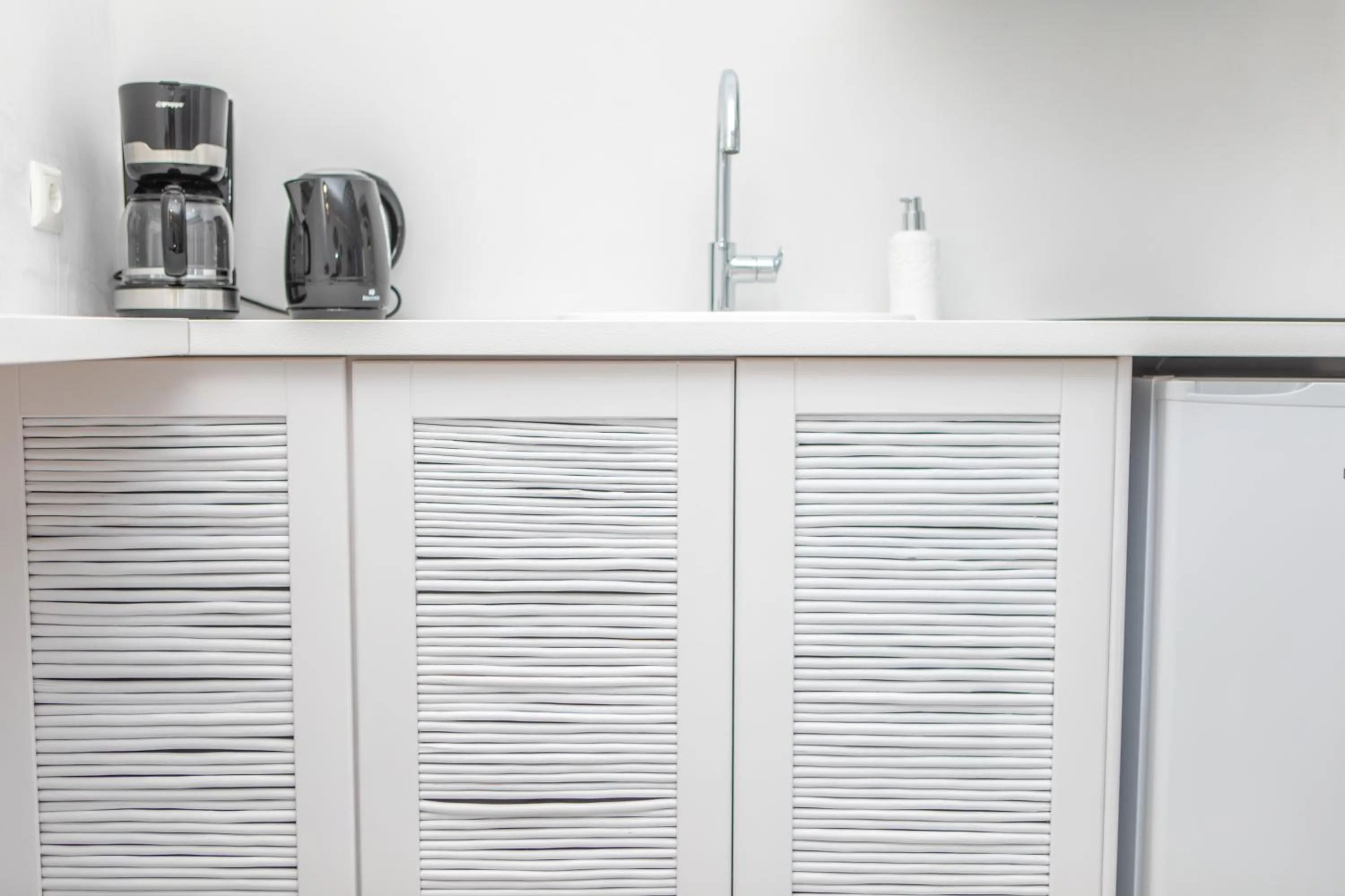 Kitchen or kitchenette in Crystal Mare Suites