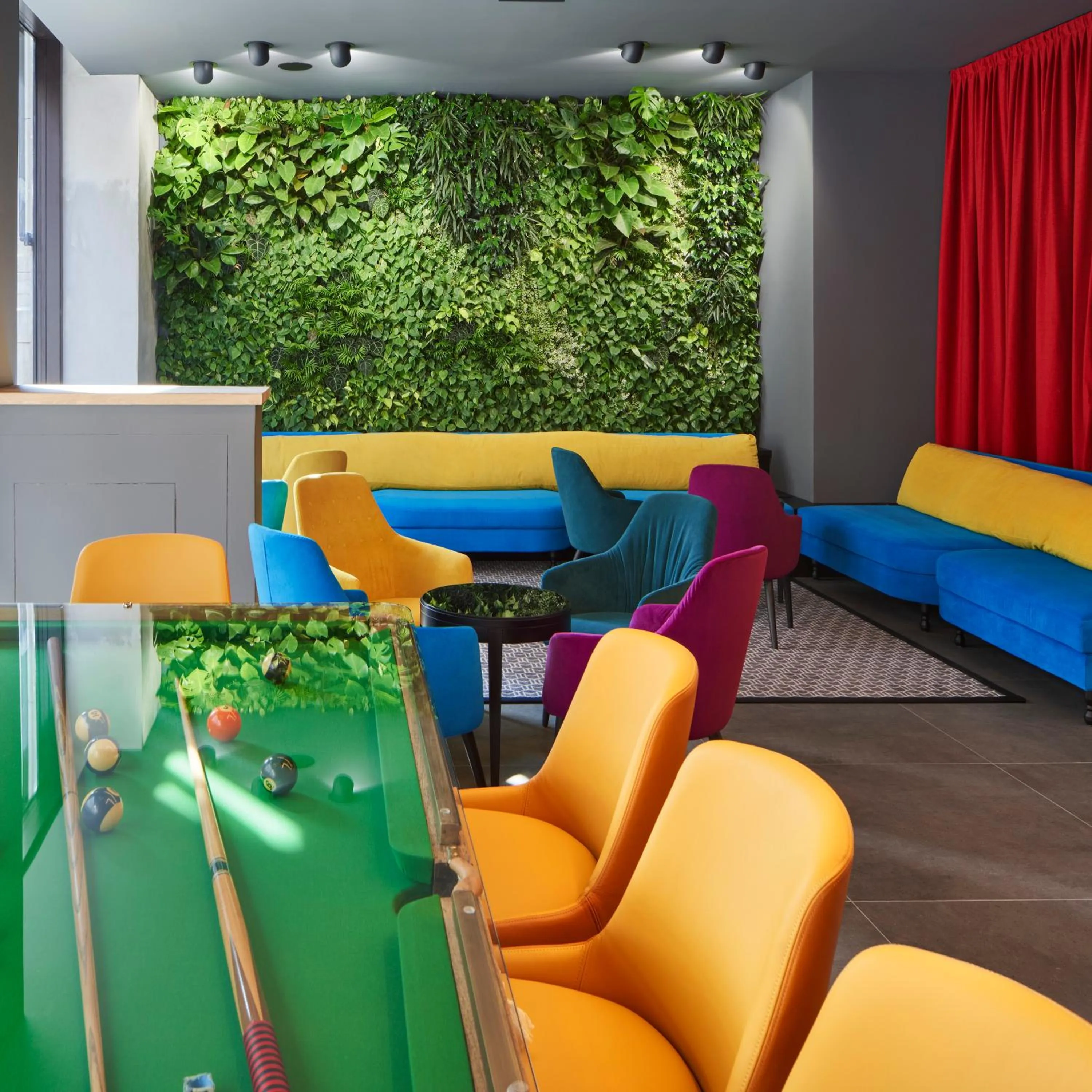 Communal lounge/ TV room in The Modernist Hotel