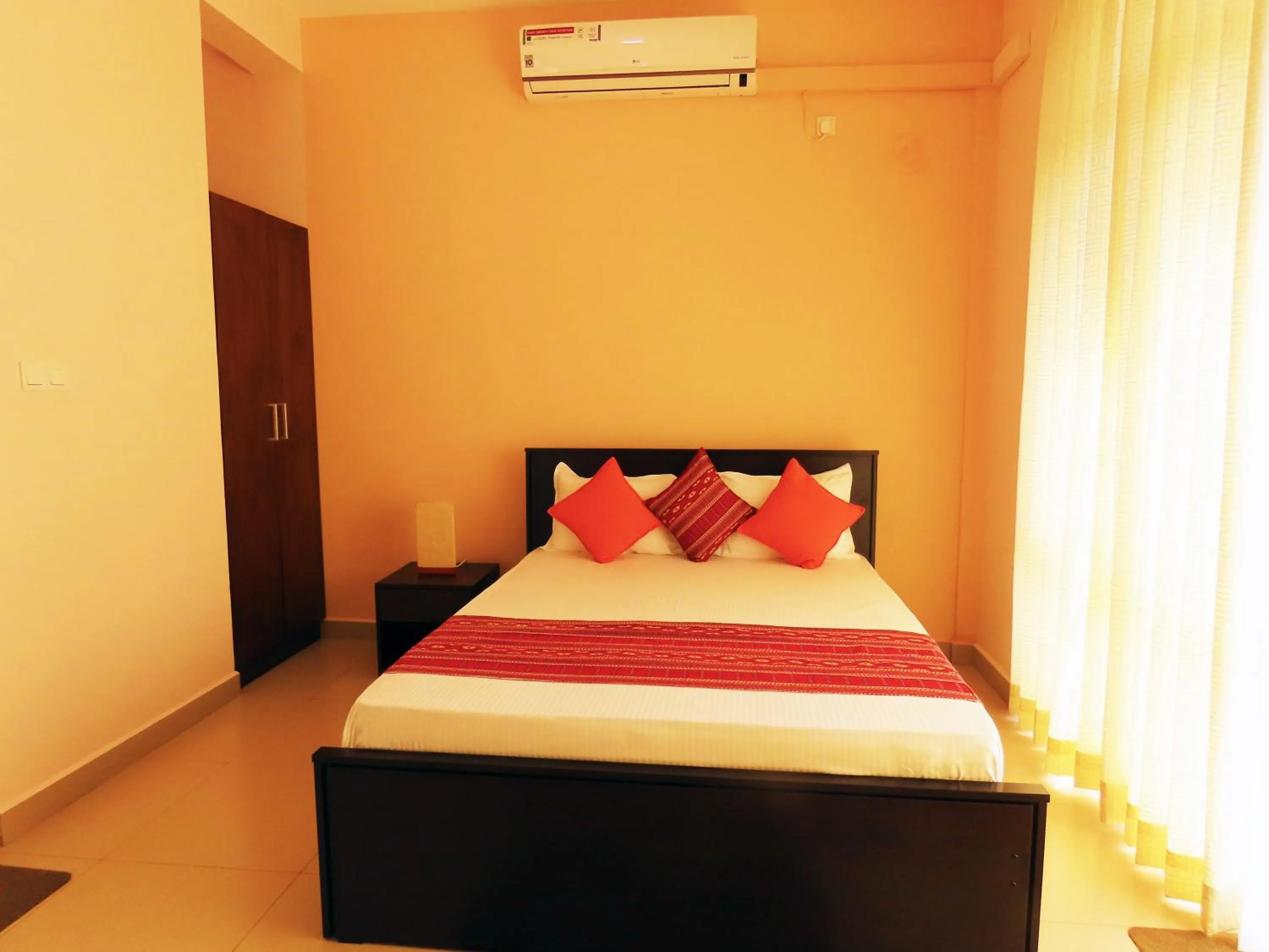 Bed in VIVAS Residencies Luxury Apartments