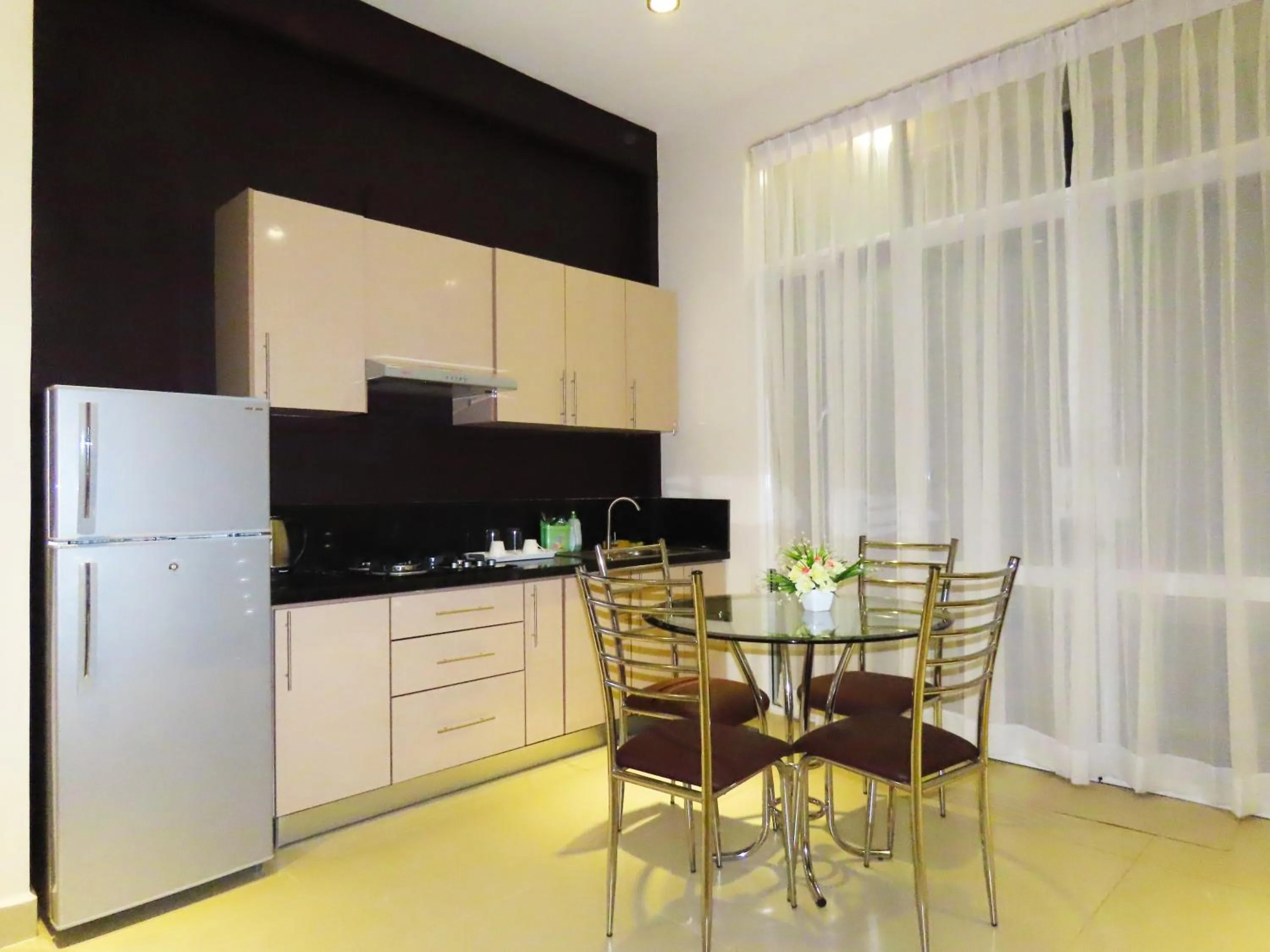 Kitchen or kitchenette in VIVAS Residencies Luxury Apartments
