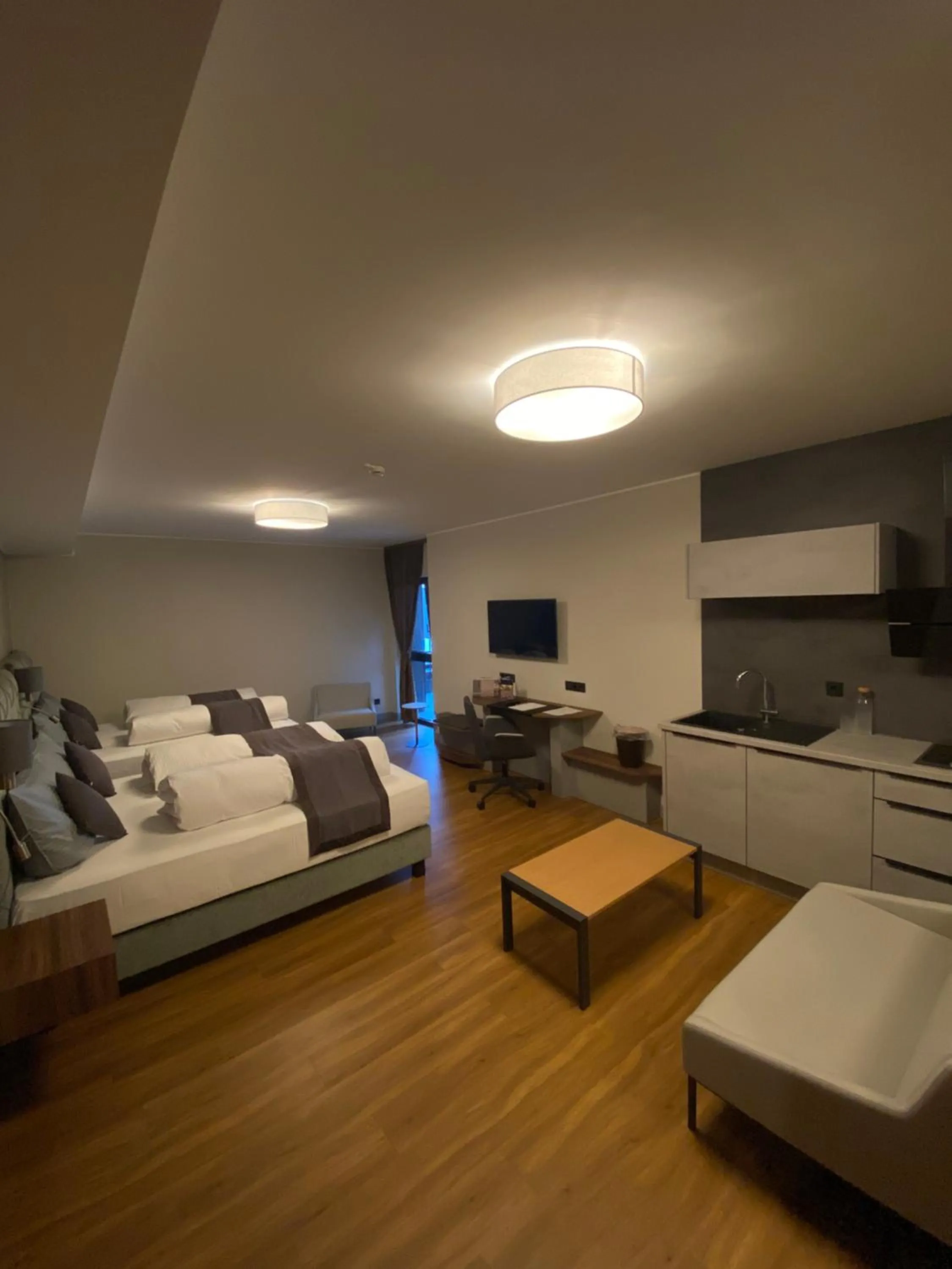 Photo of the whole room, Bed in Intergroup Business & Design Hotel Ingolstadt