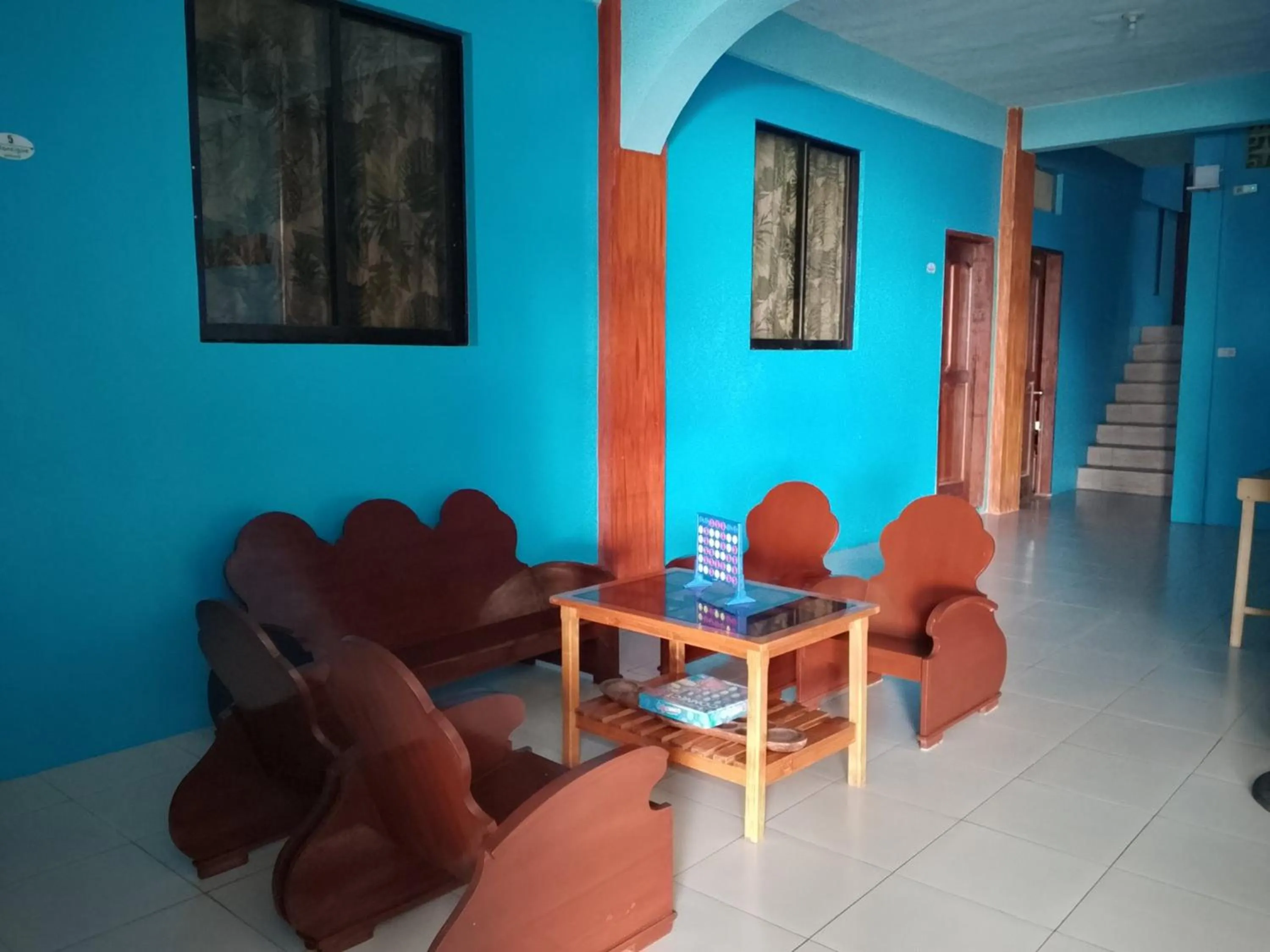 Seating area in July's Haven Seaside Pension Camiguin