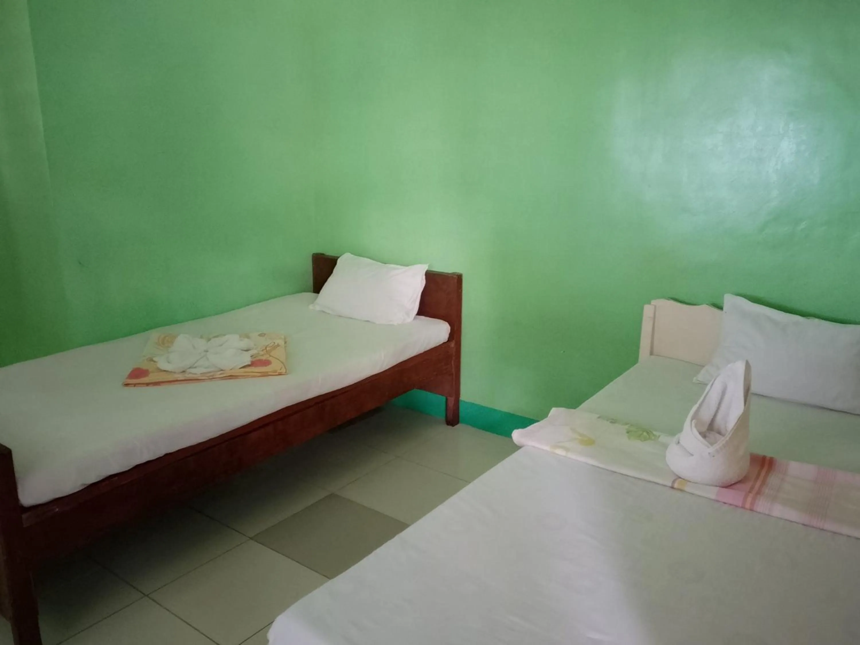 Bedroom, Bed in July's Haven Seaside Pension Camiguin