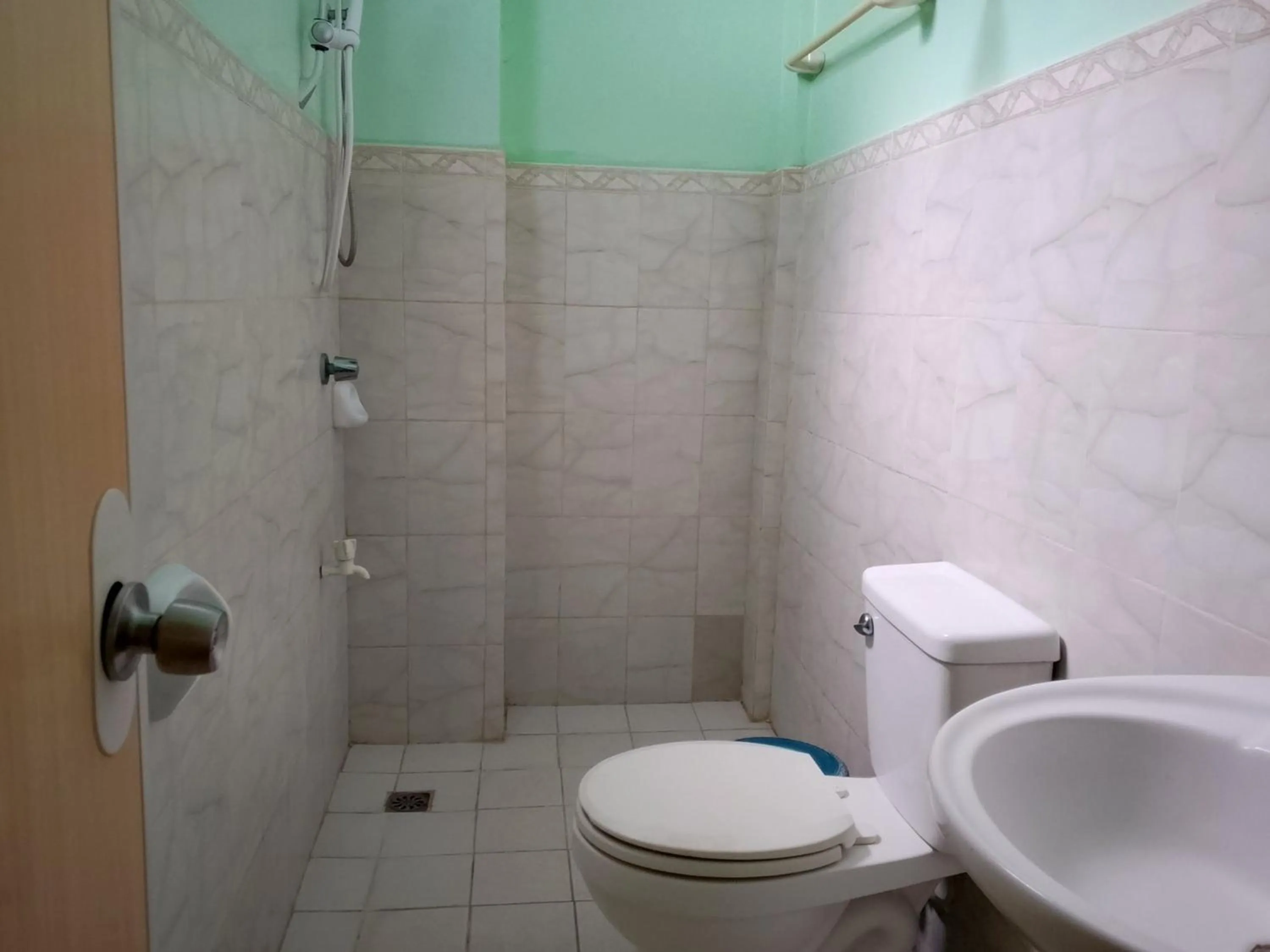 Shower in July's Haven Seaside Pension Camiguin