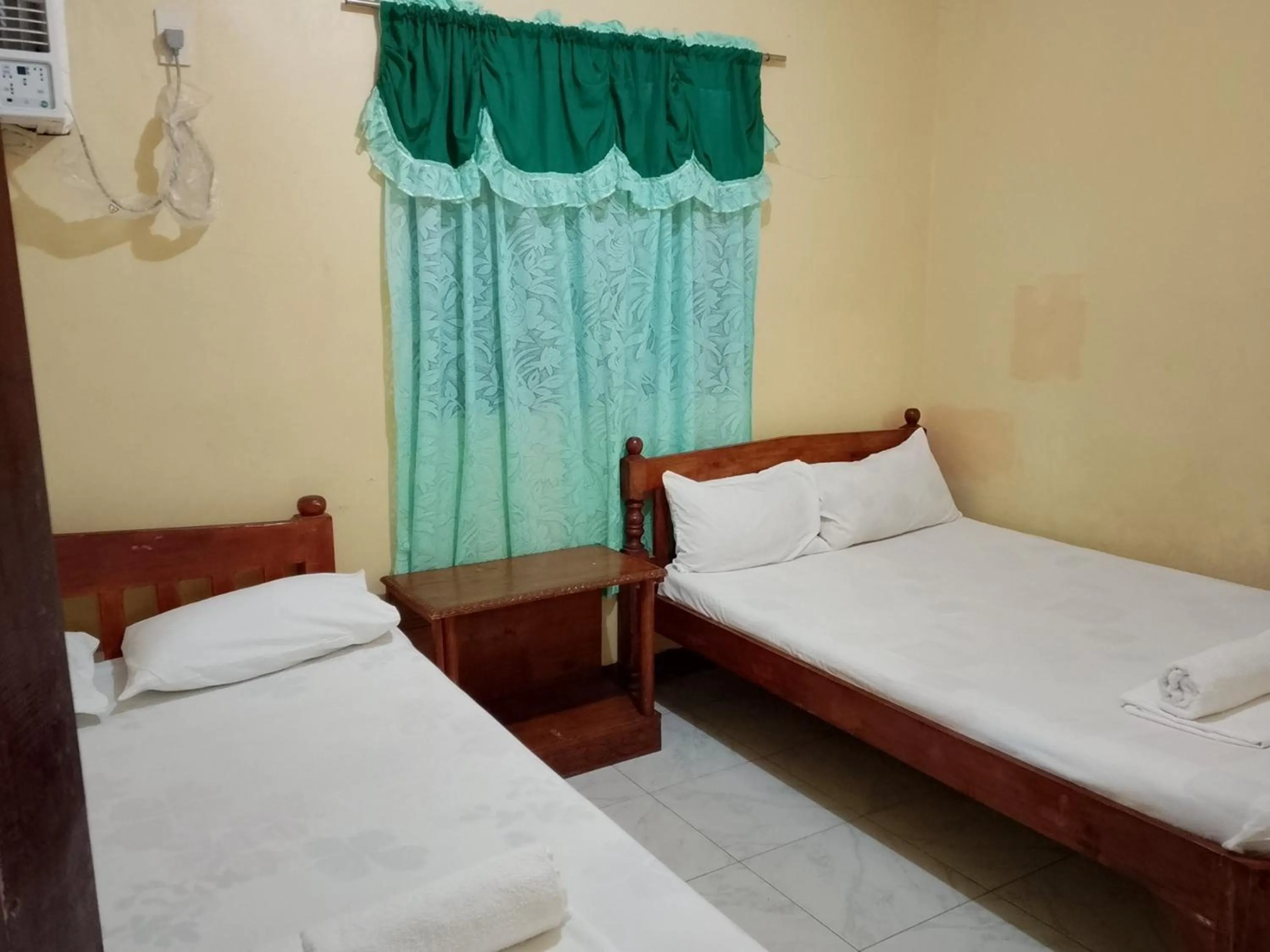 Photo of the whole room, Bed in July's Haven Seaside Pension Camiguin