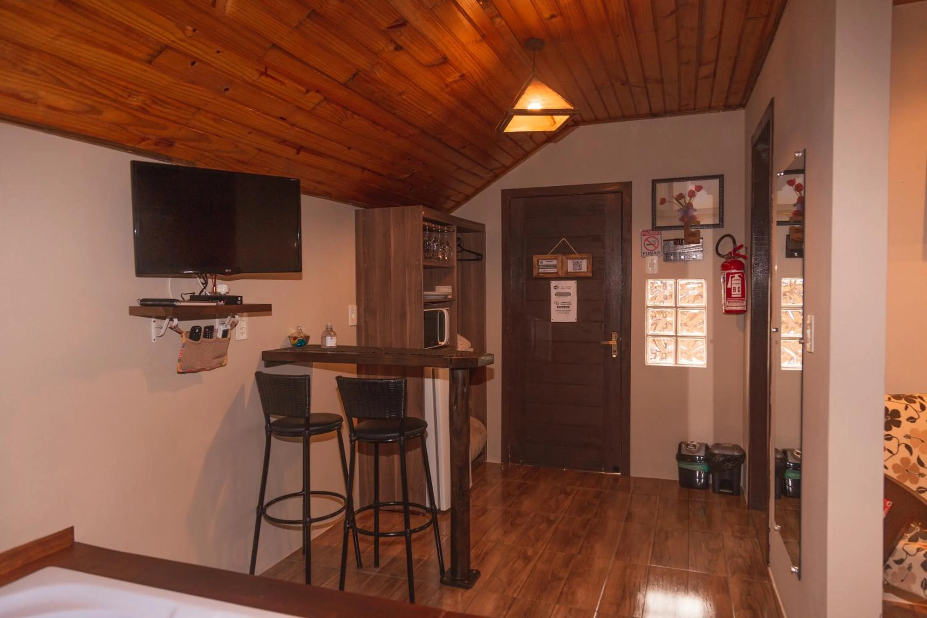 Communal lounge/ TV room in Pousada Recanto dos Canyons