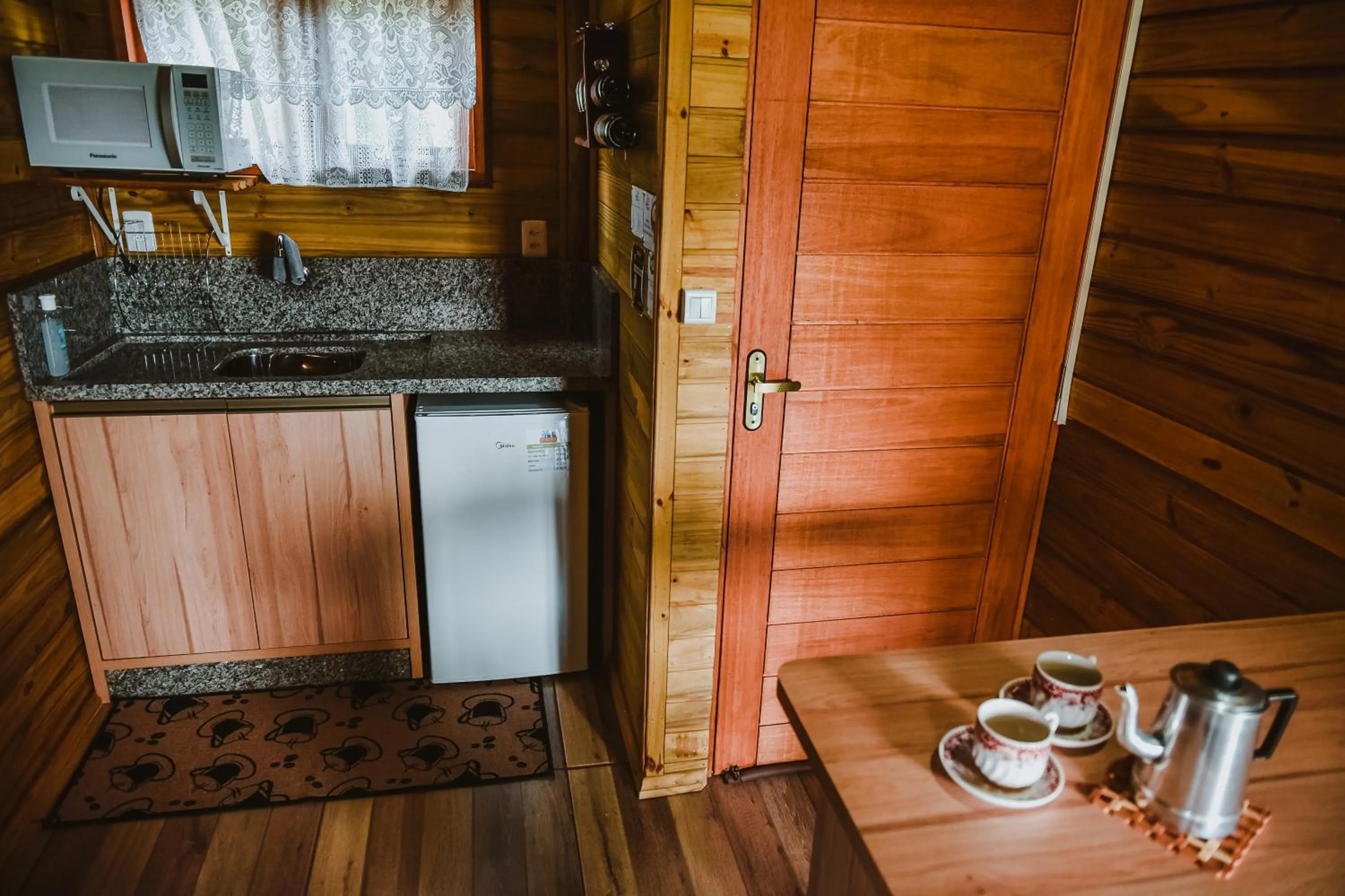 Kitchen or kitchenette in Pousada Recanto dos Canyons