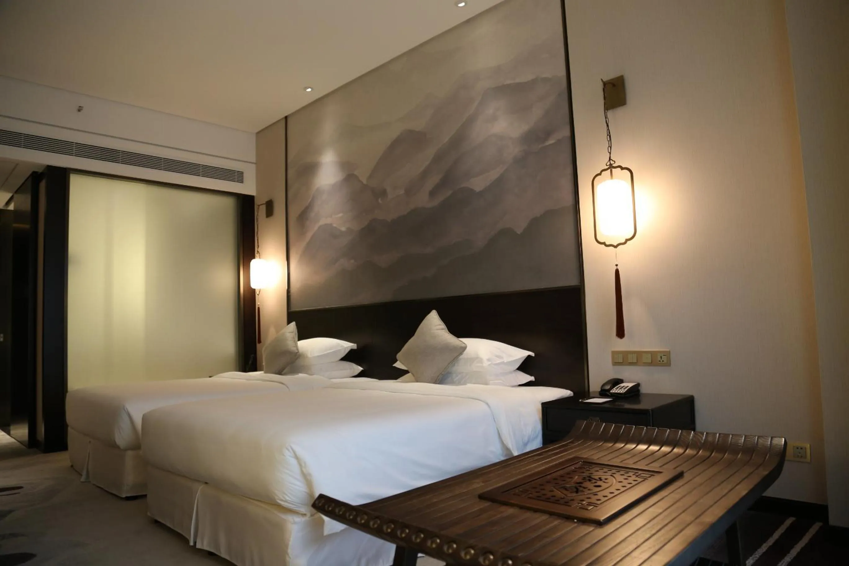 Bed in Amitabha Hotel (Fuzhou Pushang)