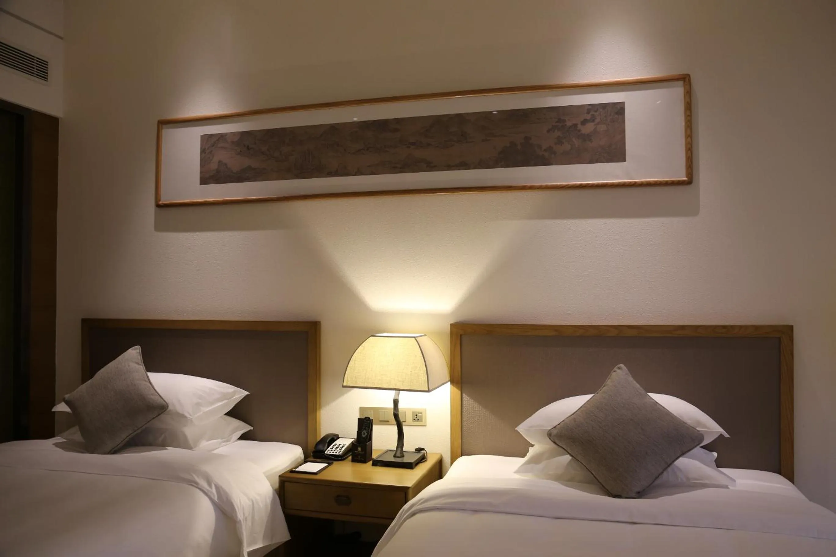 Bed in Amitabha Hotel (Fuzhou Pushang)