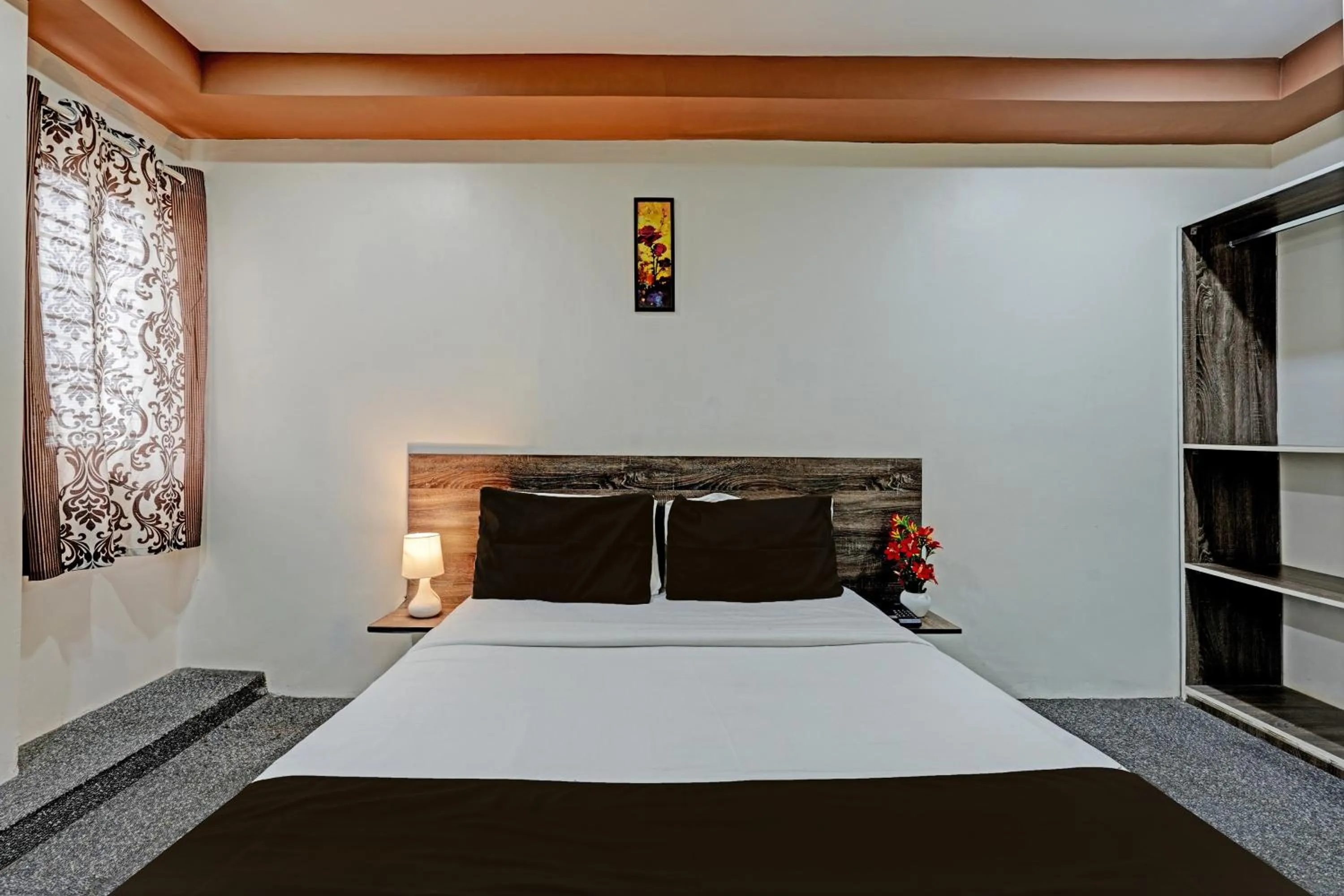 Bedroom in Hotel O Sri Sai sevalal comfort's