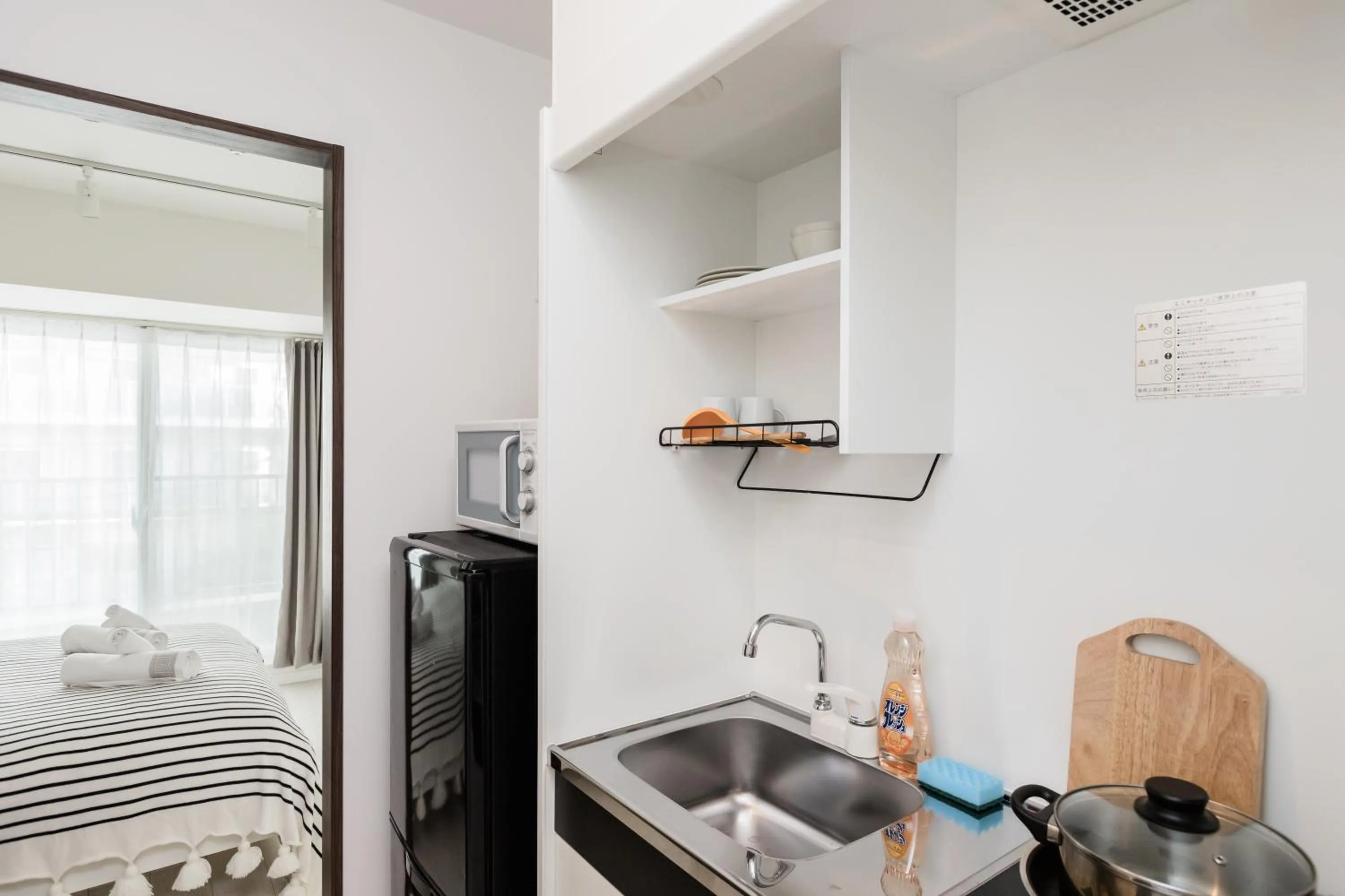 Kitchen or kitchenette in Hotel Apartment Ueno Inaricho Sta