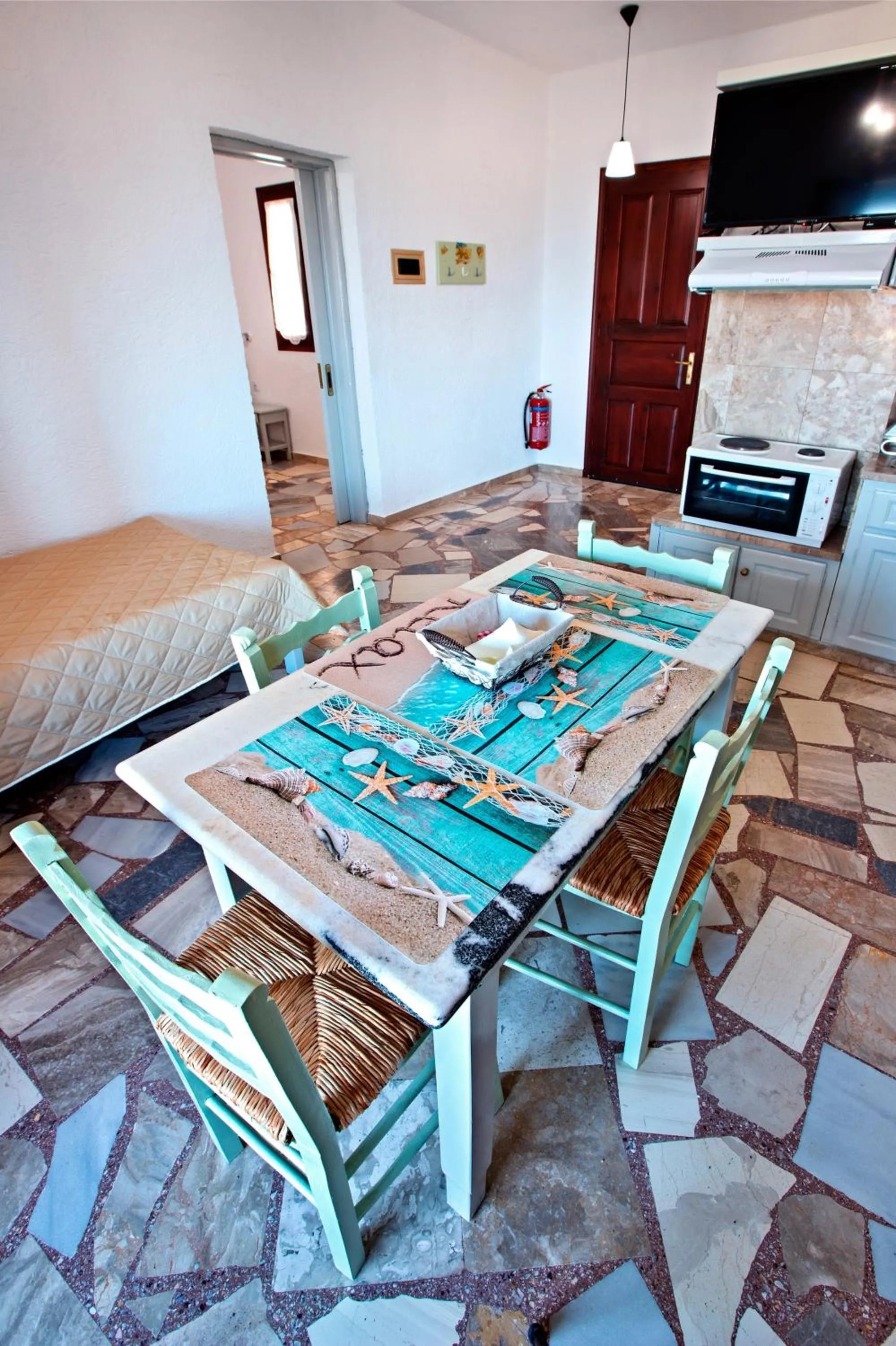 Seating area in New Aurora Apts Studios