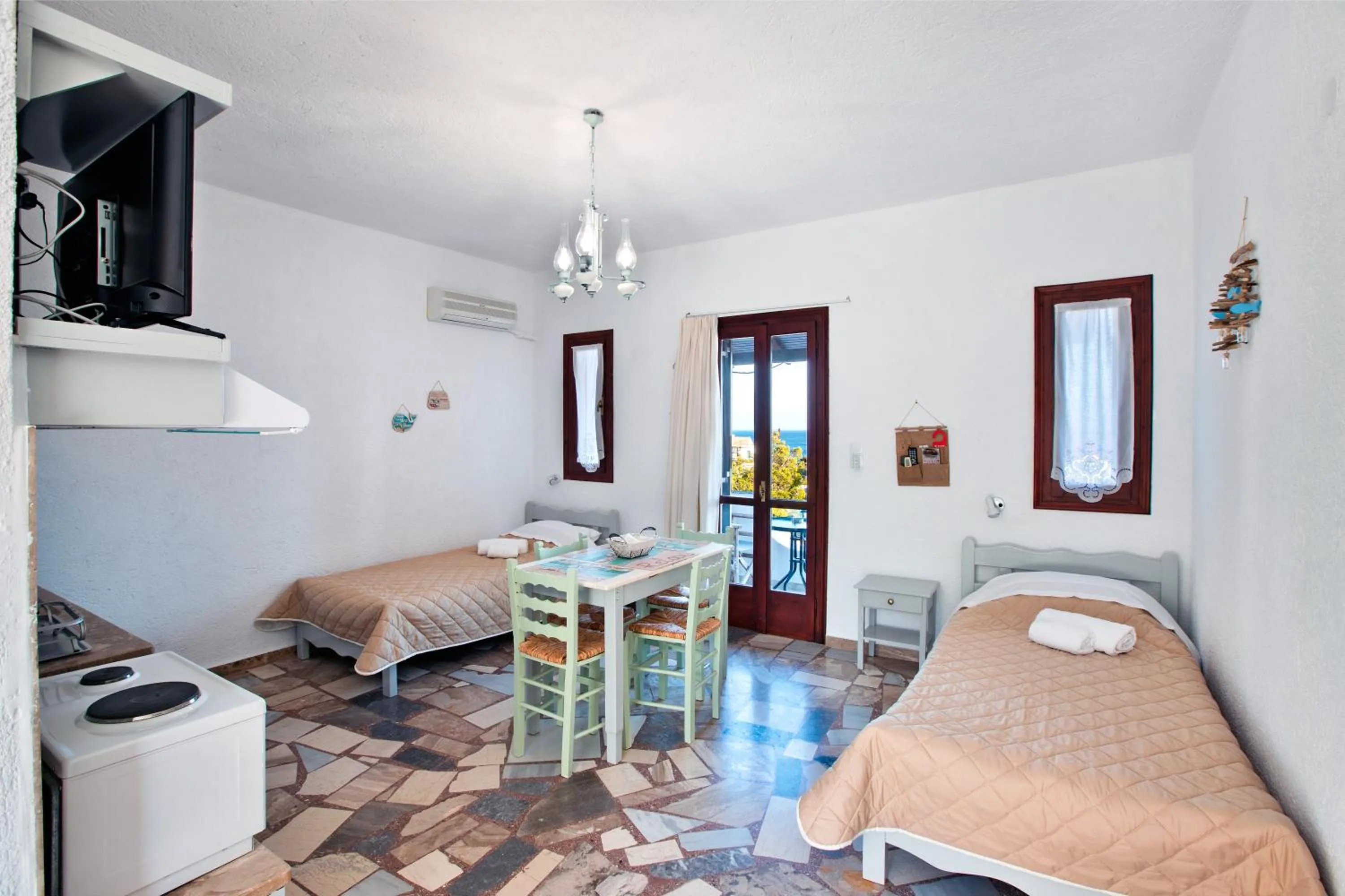 Photo of the whole room in New Aurora Apts Studios