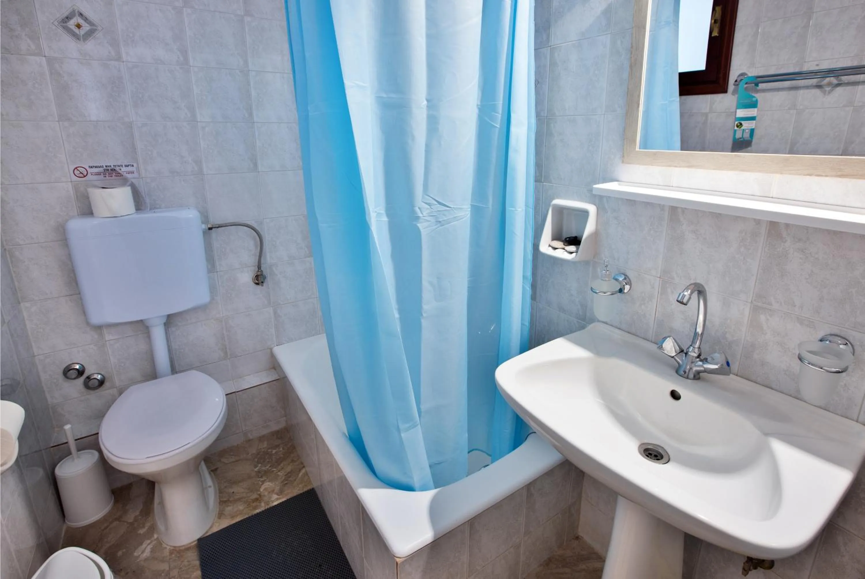 Toilet in New Aurora Apts Studios