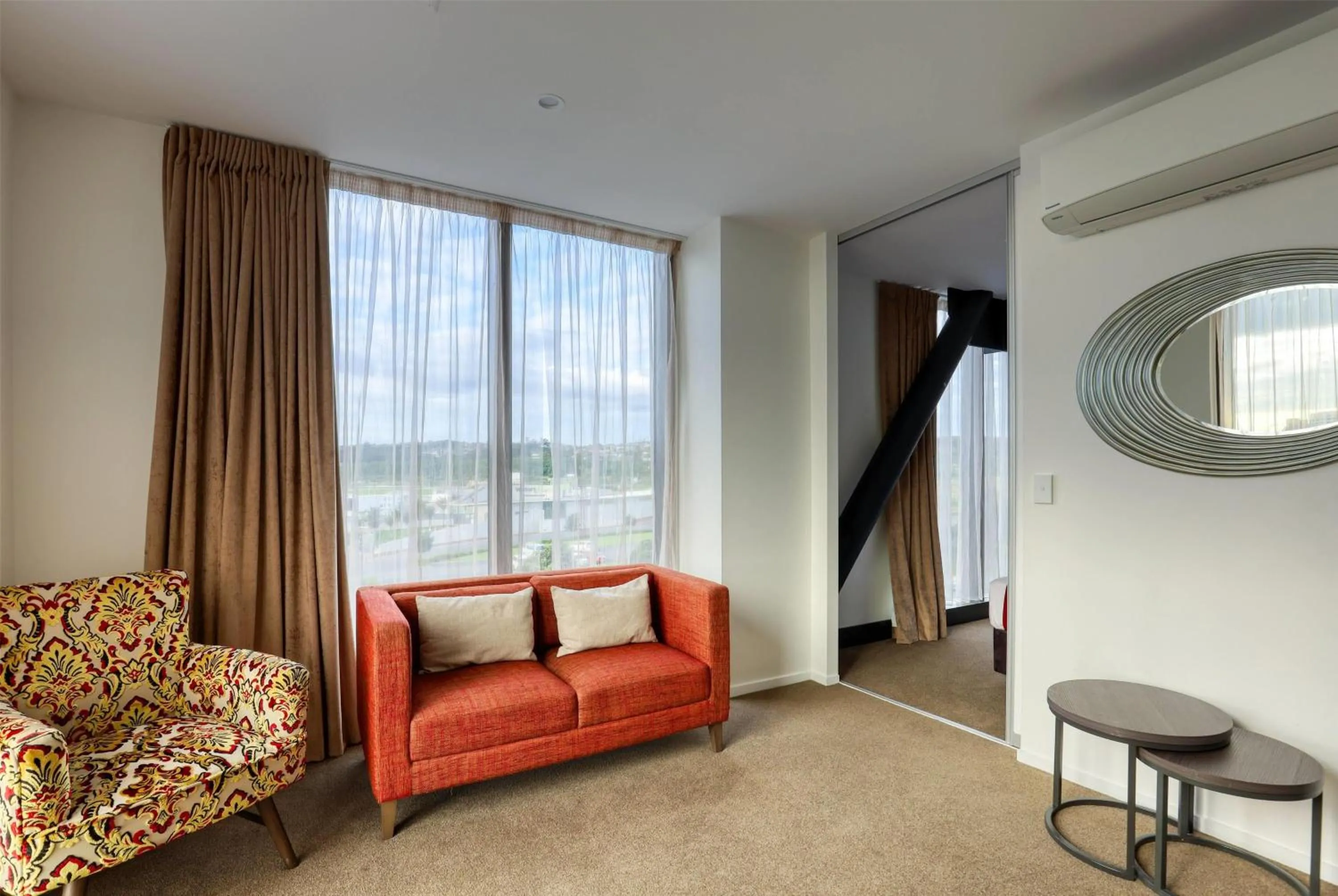 Photo of the whole room in Ramada Suites by Wyndham Auckland Manukau Pacfic Centre