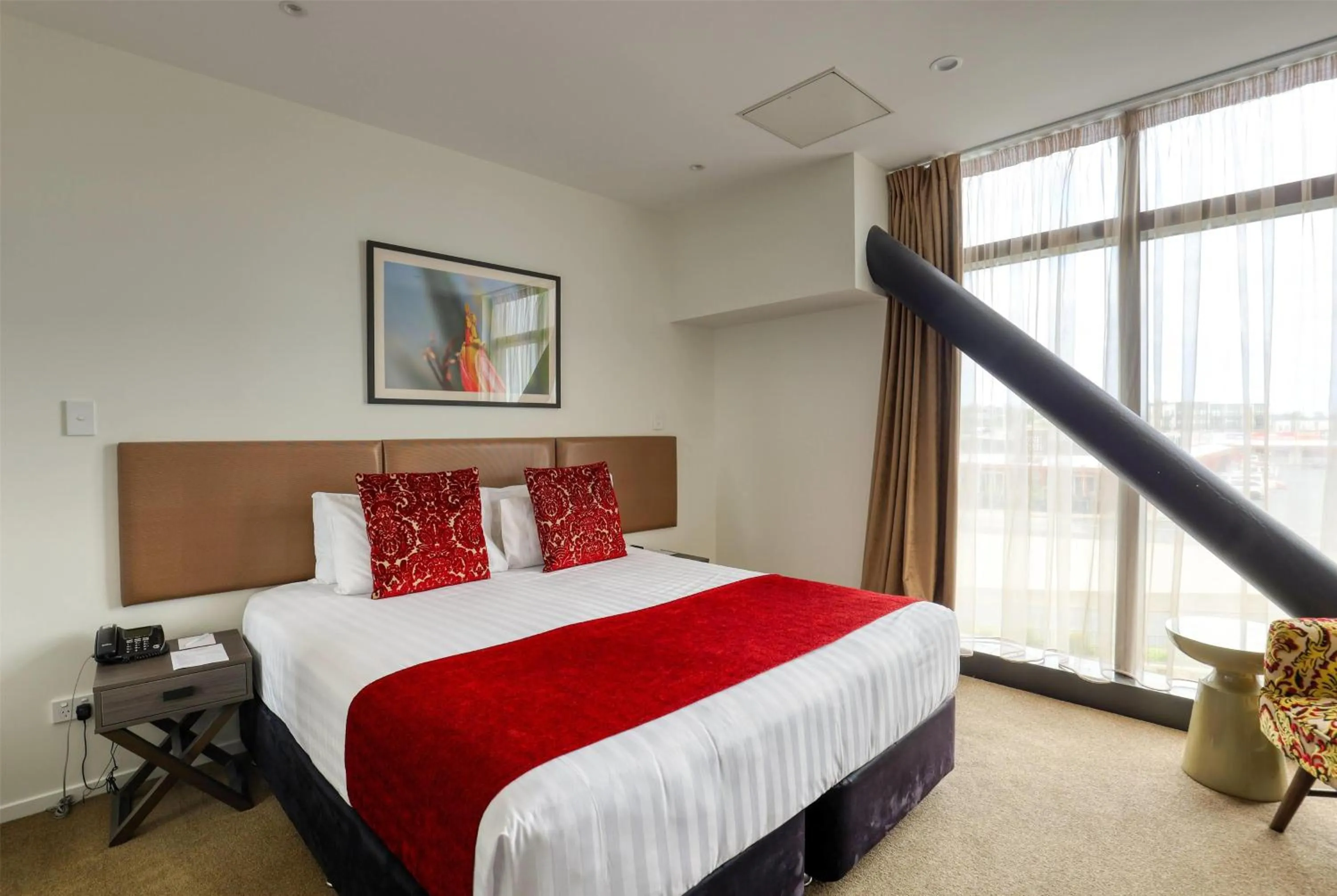 Photo of the whole room, Bed in Ramada Suites by Wyndham Auckland Manukau Pacfic Centre
