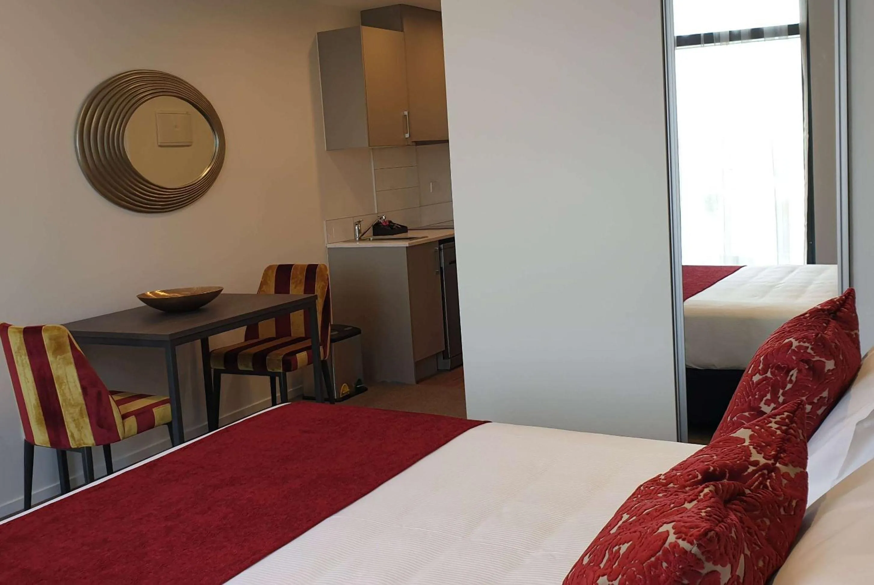 Photo of the whole room, Bed in Ramada Suites by Wyndham Auckland Manukau Pacfic Centre