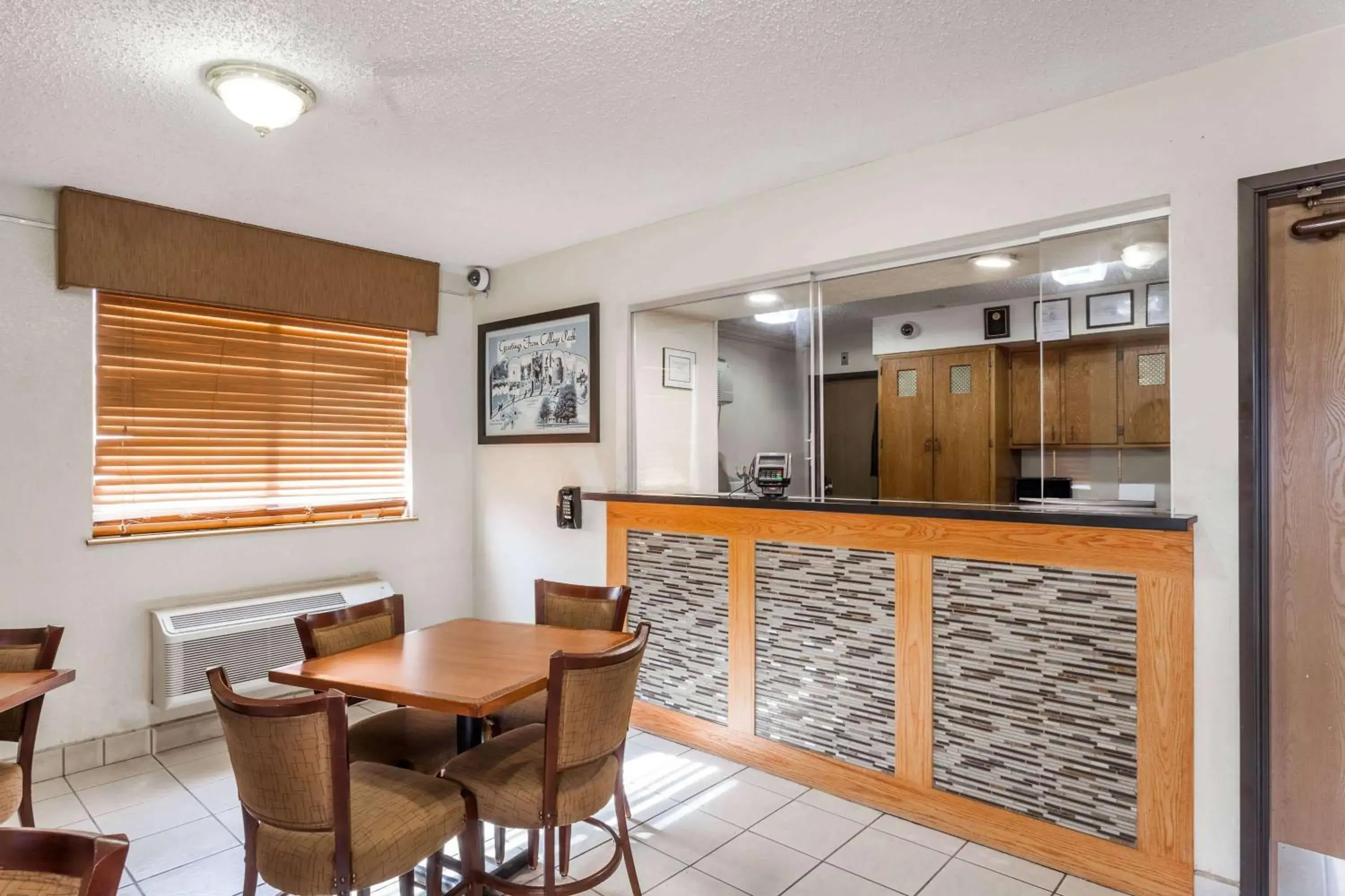 Lobby or reception in Super 8 by Wyndham College Park Wash DC Area Lobby or reception in Super 8 by Wyndham College Park Wash DC Area