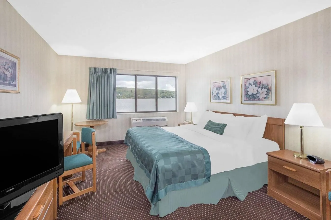 Bedroom, Bed in Ramada by Wyndham Hancock Waterfront