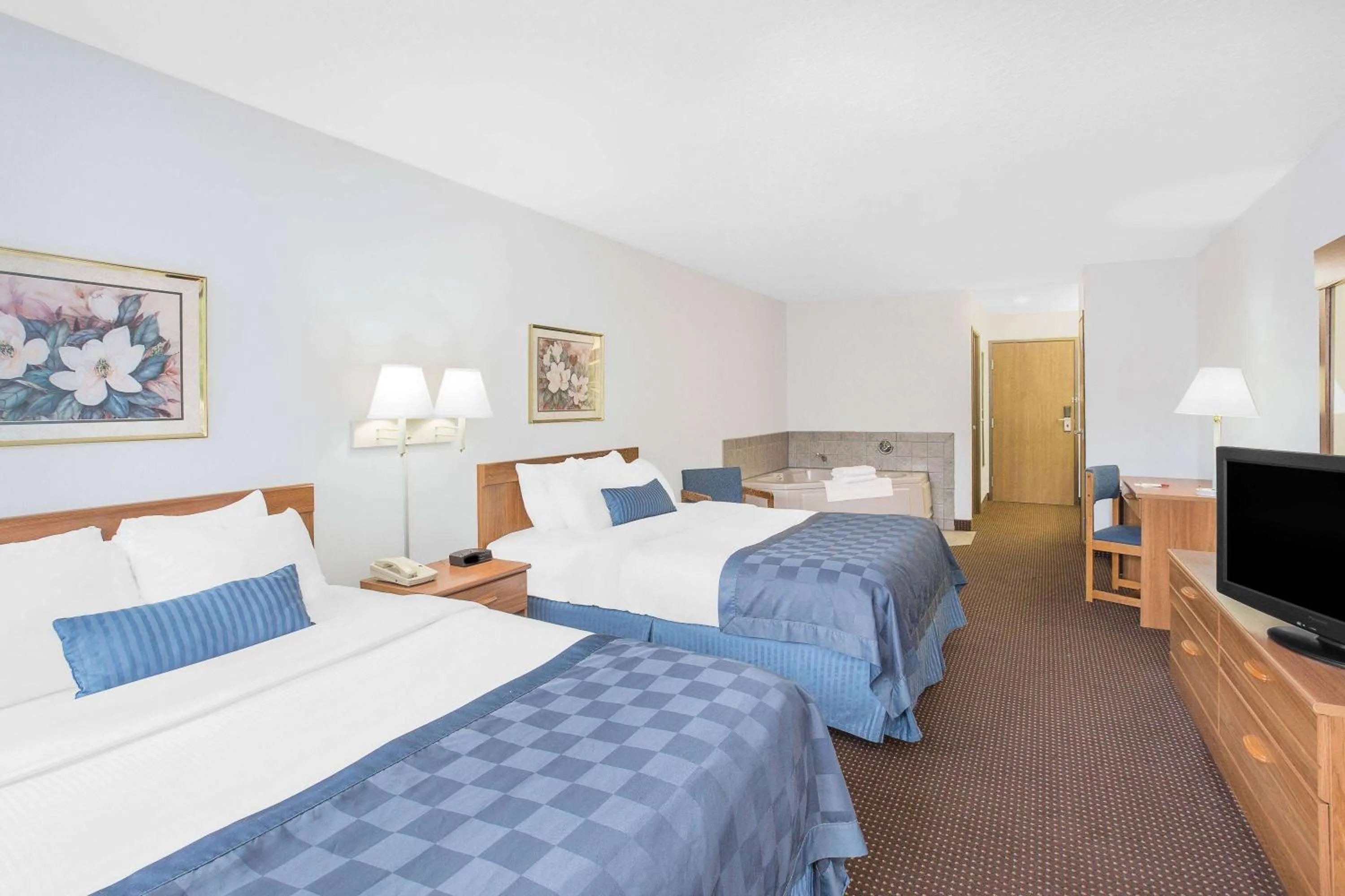 Photo of the whole room, Bed in Ramada by Wyndham Hancock Waterfront